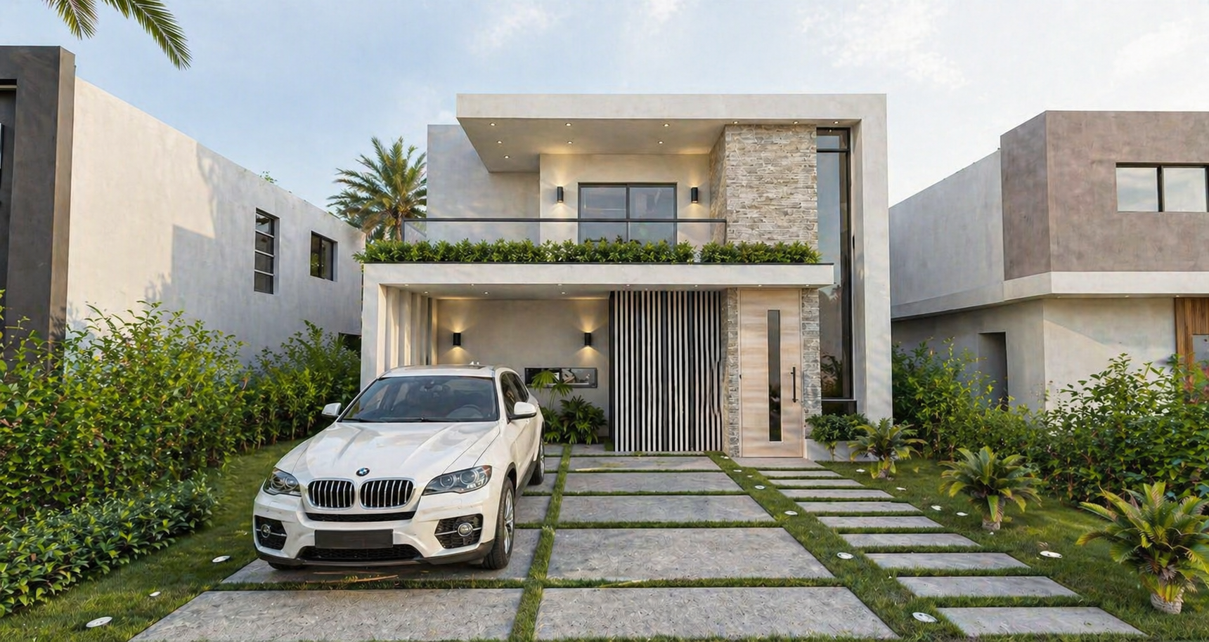 Modern two-story house with a white BMW parked in front, surrounded by green plants and a well-maintained lawn, with a pathway leading to the front door.