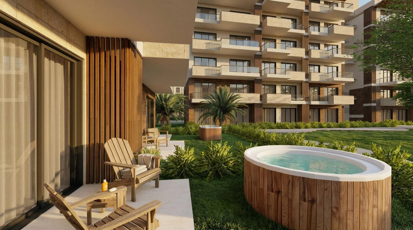 Balcony view of modern apartment complex with outdoor hot tub, wooden furniture, lush green landscaping, and palm trees.