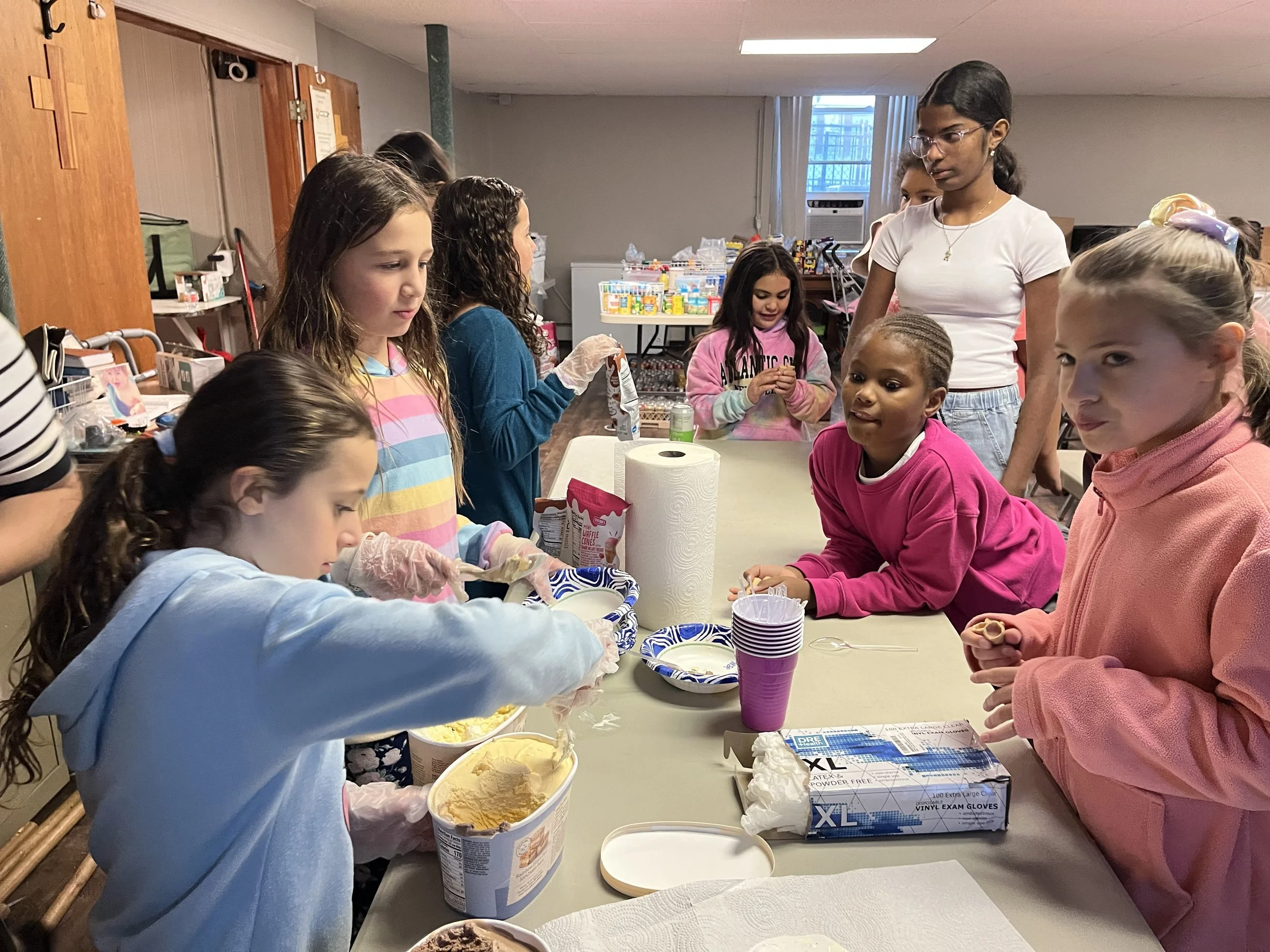 Children baking together during a church fellowship activity