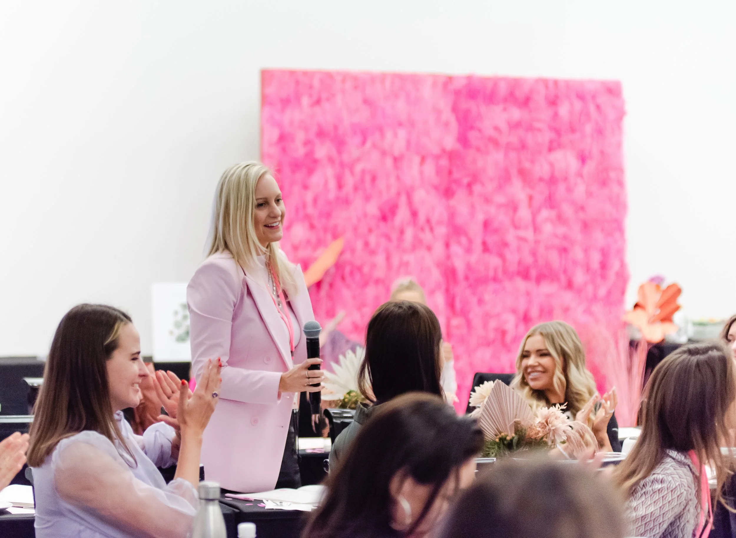 Jenna Webb speaking on course strategy at an online business event