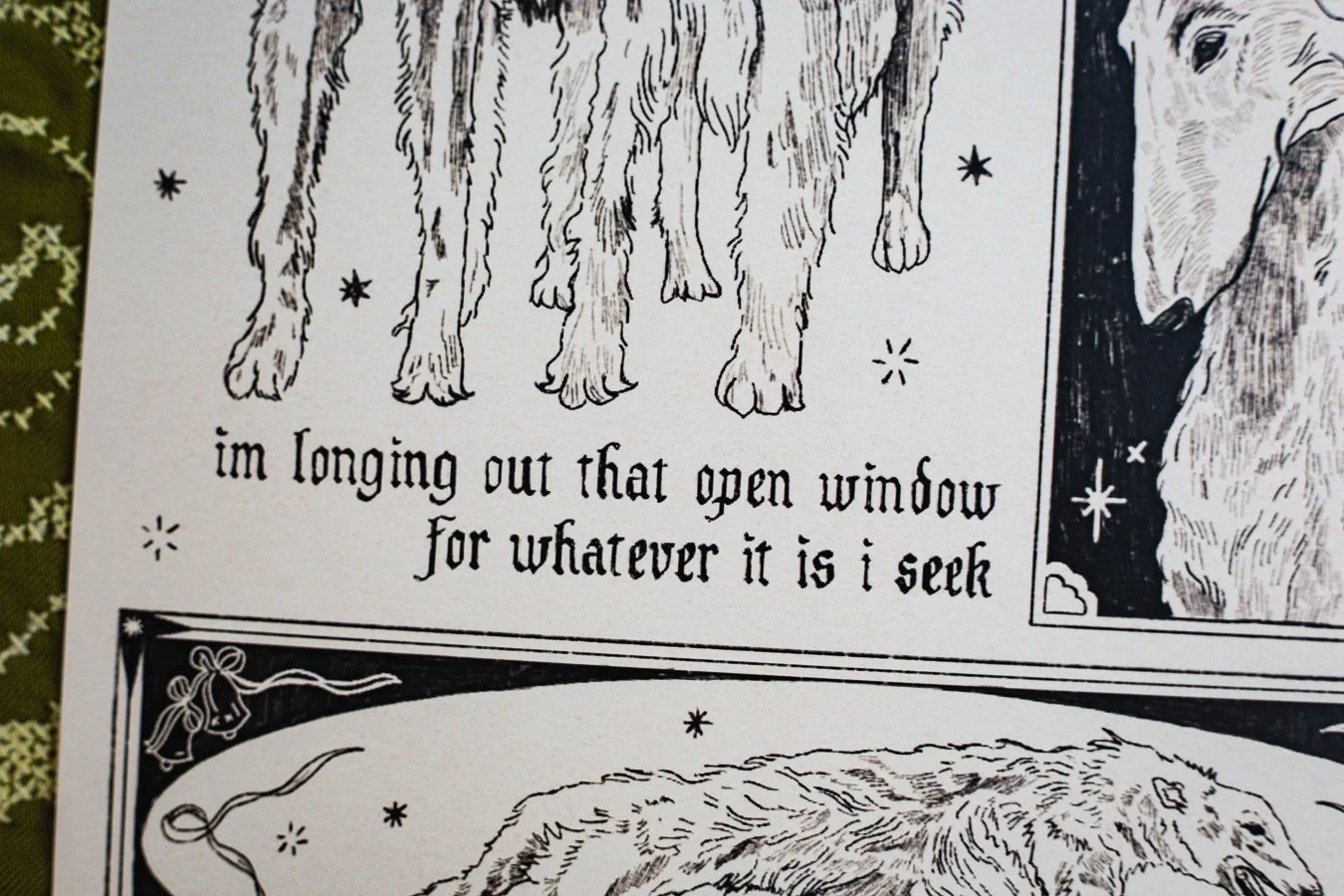 Dog print reads "I'm longing out that open window for whatever it is I seek"