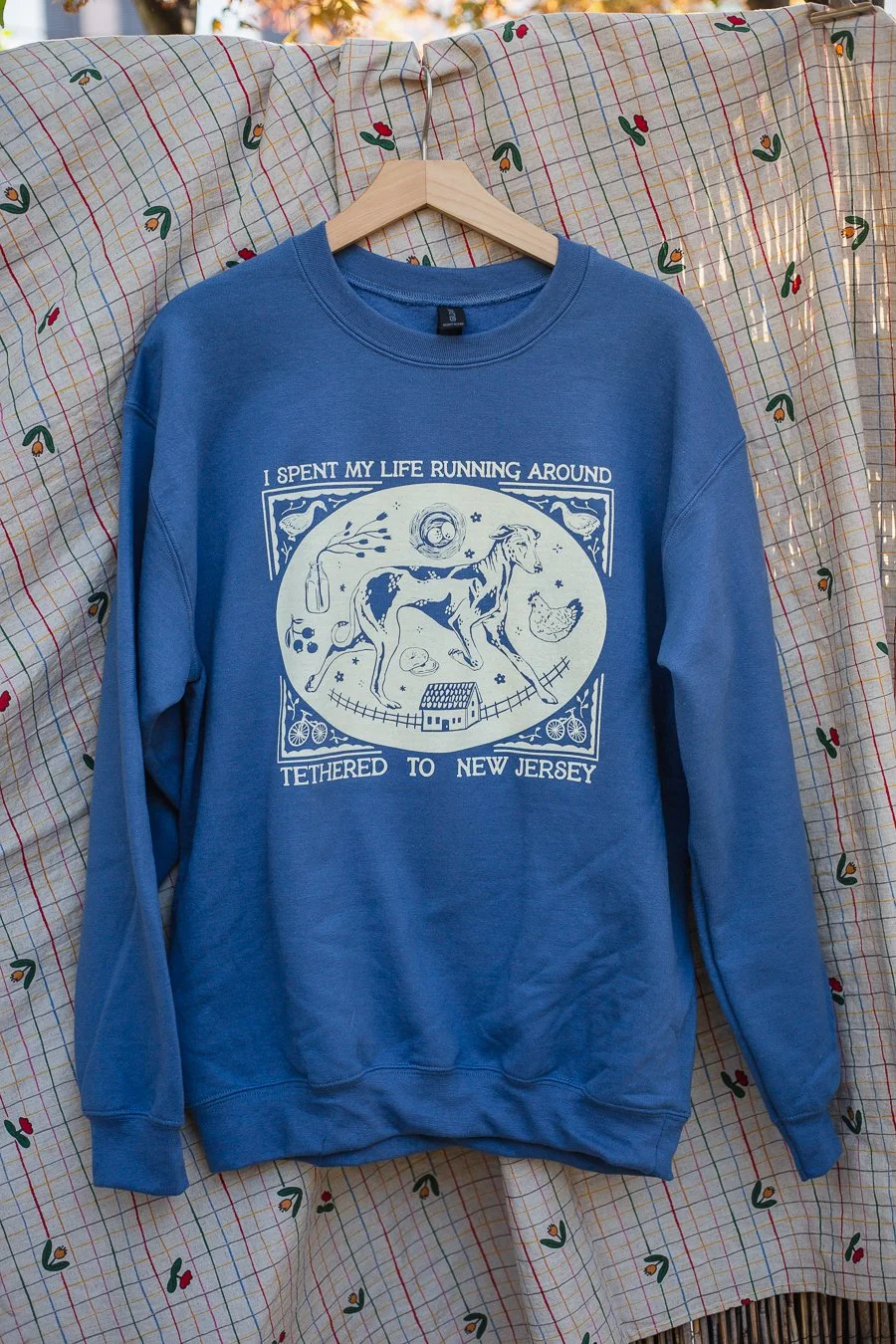 I spent my life running around tethered to New Jersey crewneck