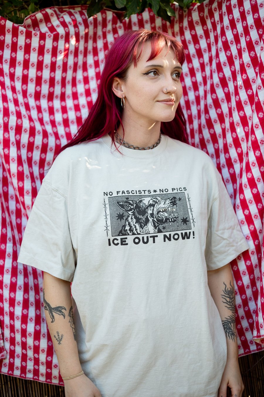 T-shirt front reads No Fascists No Pigs ICE Out Now