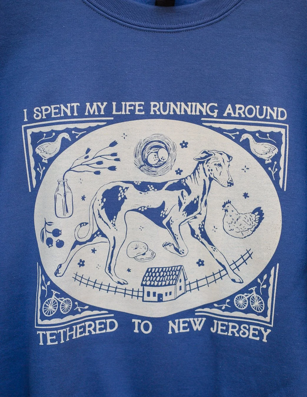 I spent my life running around tethered to New Jersey crewneck in Blue