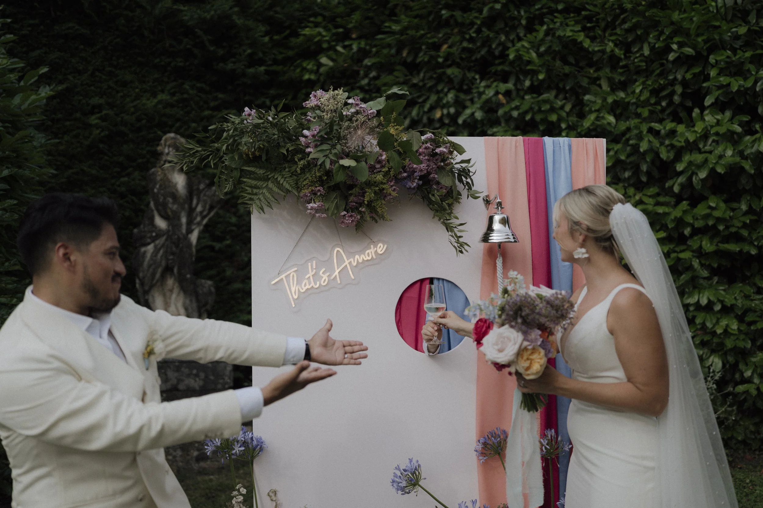 Custom interactive Prosecco wall with ring for bubbles bell at Verona wedding