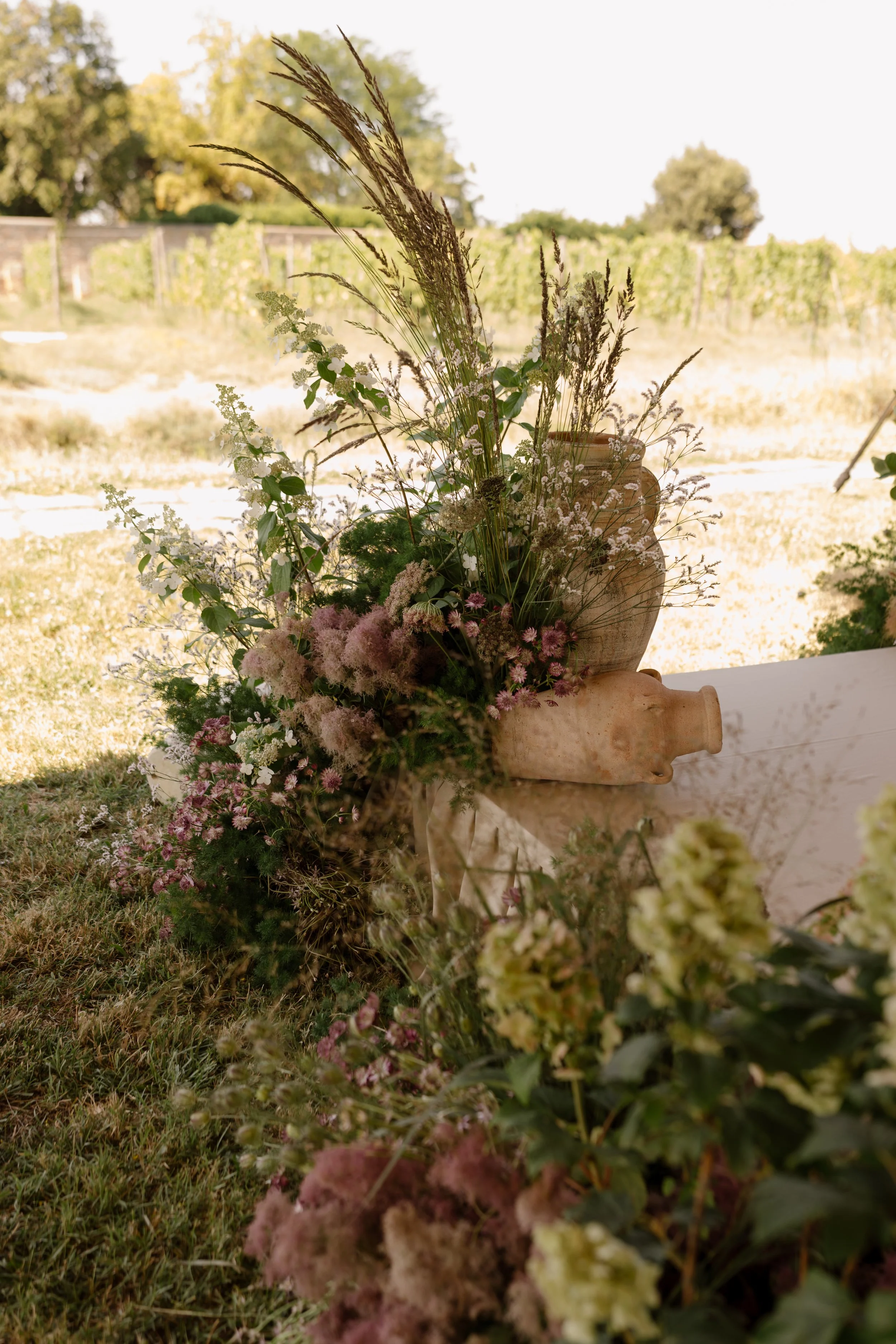 Organic botanical wedding details surrounded by vineyards at green Michelin-starred Venissa.