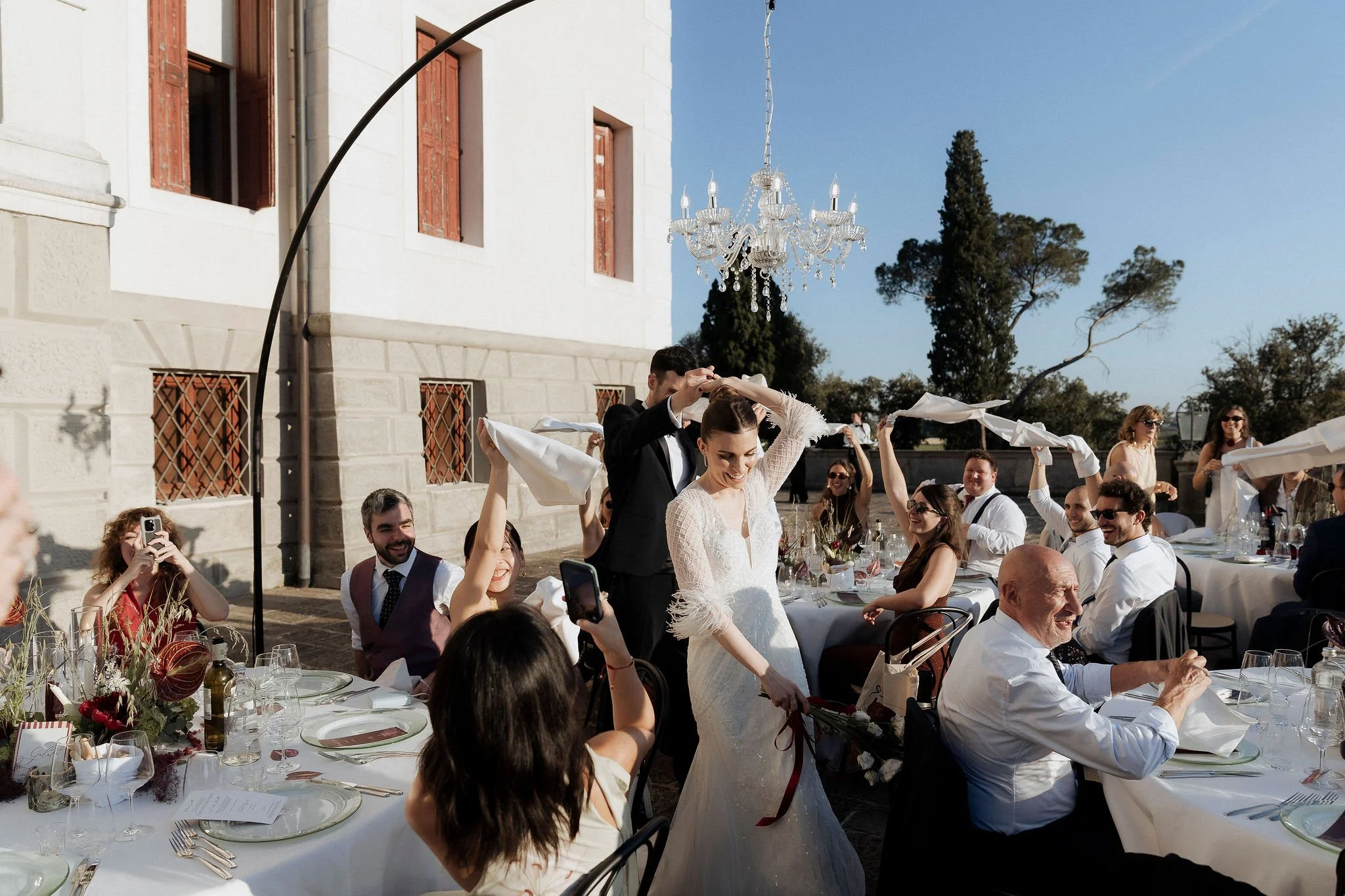 Romantic sunset wedding dinner on the terrace of Villa Selvatico.