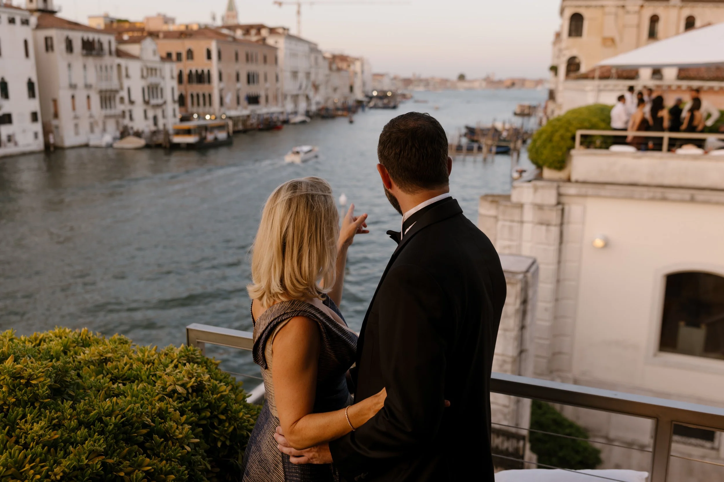 Bride and groom on a terrace in Venice.