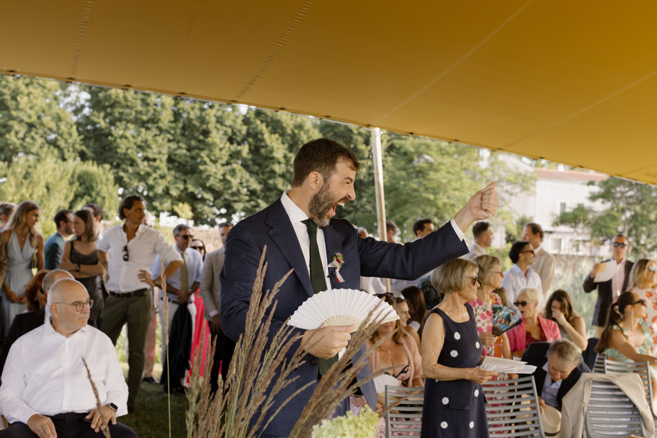 Outdoor wedding ceremony inside the walled vineyard at Venissa on Mazzorbo island, Venice.