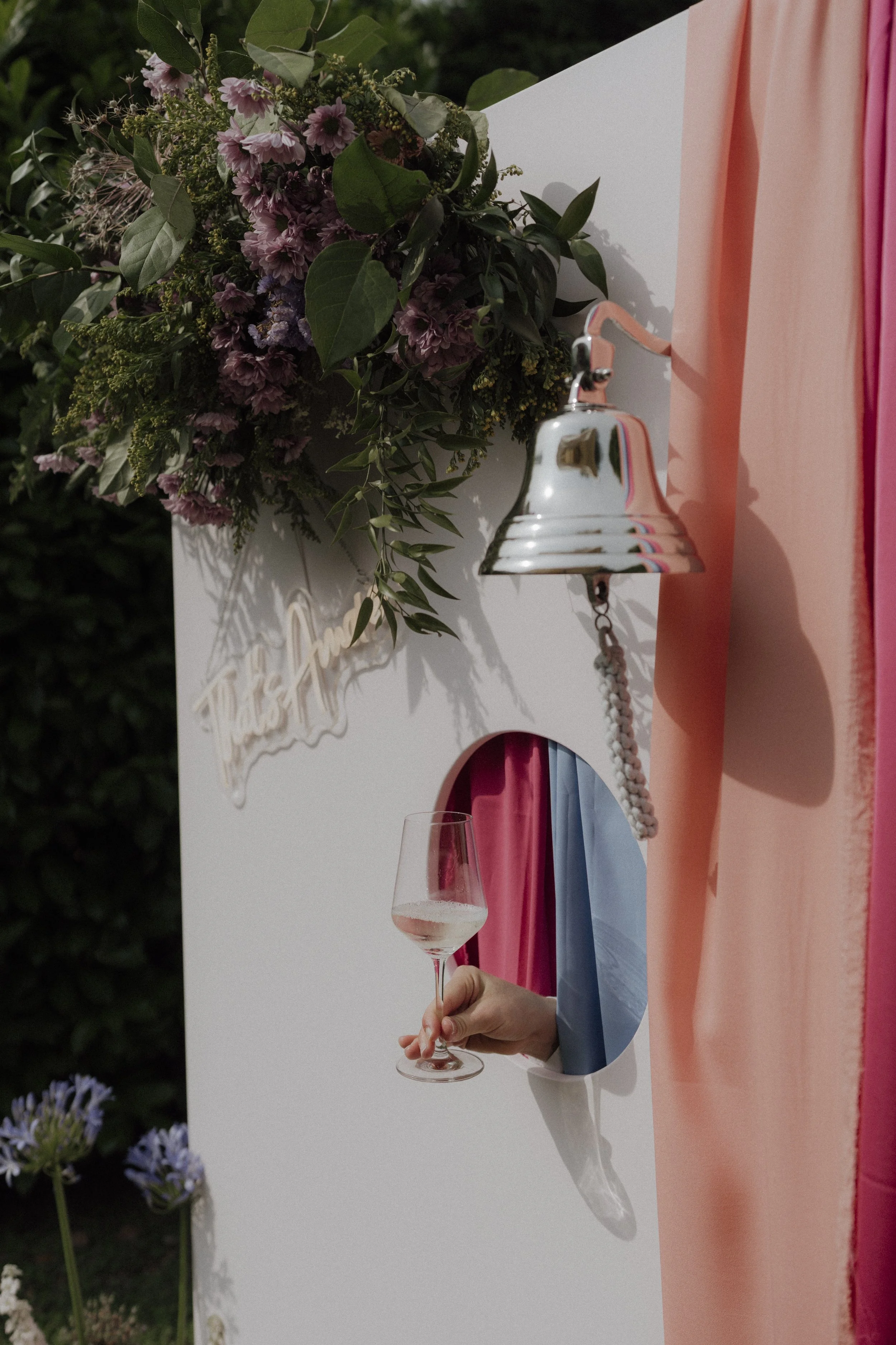 Custom interactive Prosecco wall with ring for bubbles bell at Verona wedding