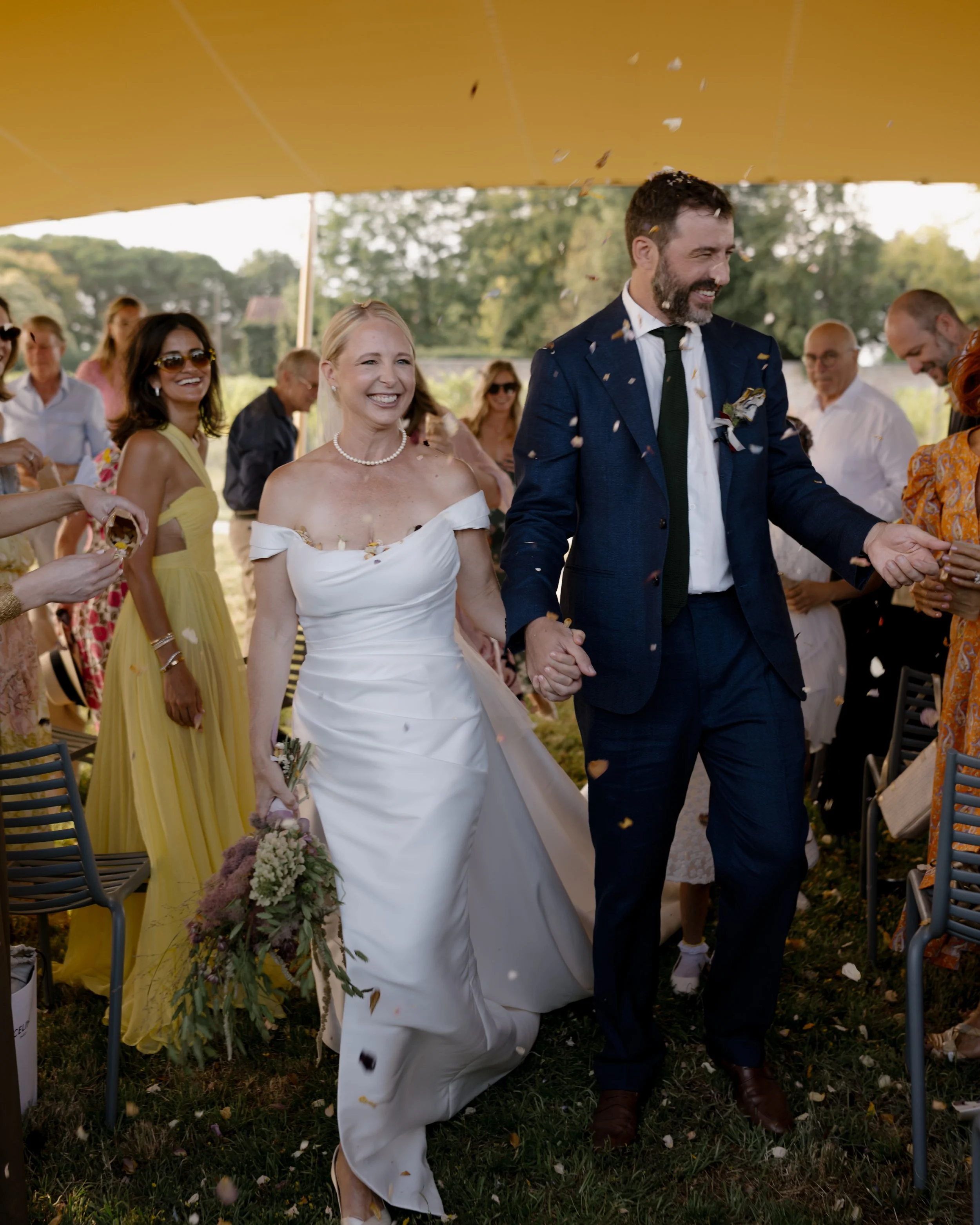 Outdoor wedding ceremony on a marquee at Venissa on Mazzorbo island, Venice.