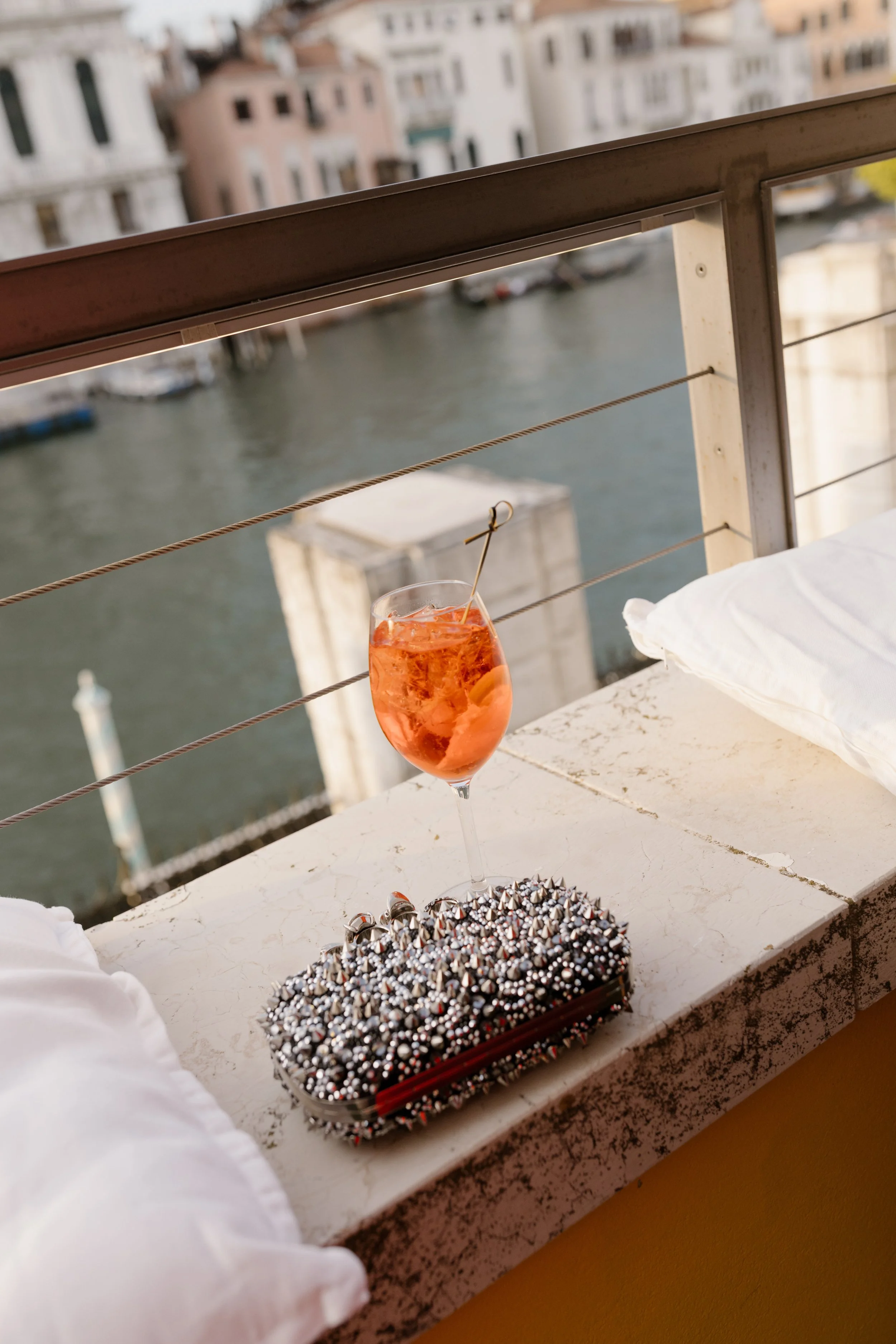 Welcome cocktail party on a Venetian rooftop terrace.