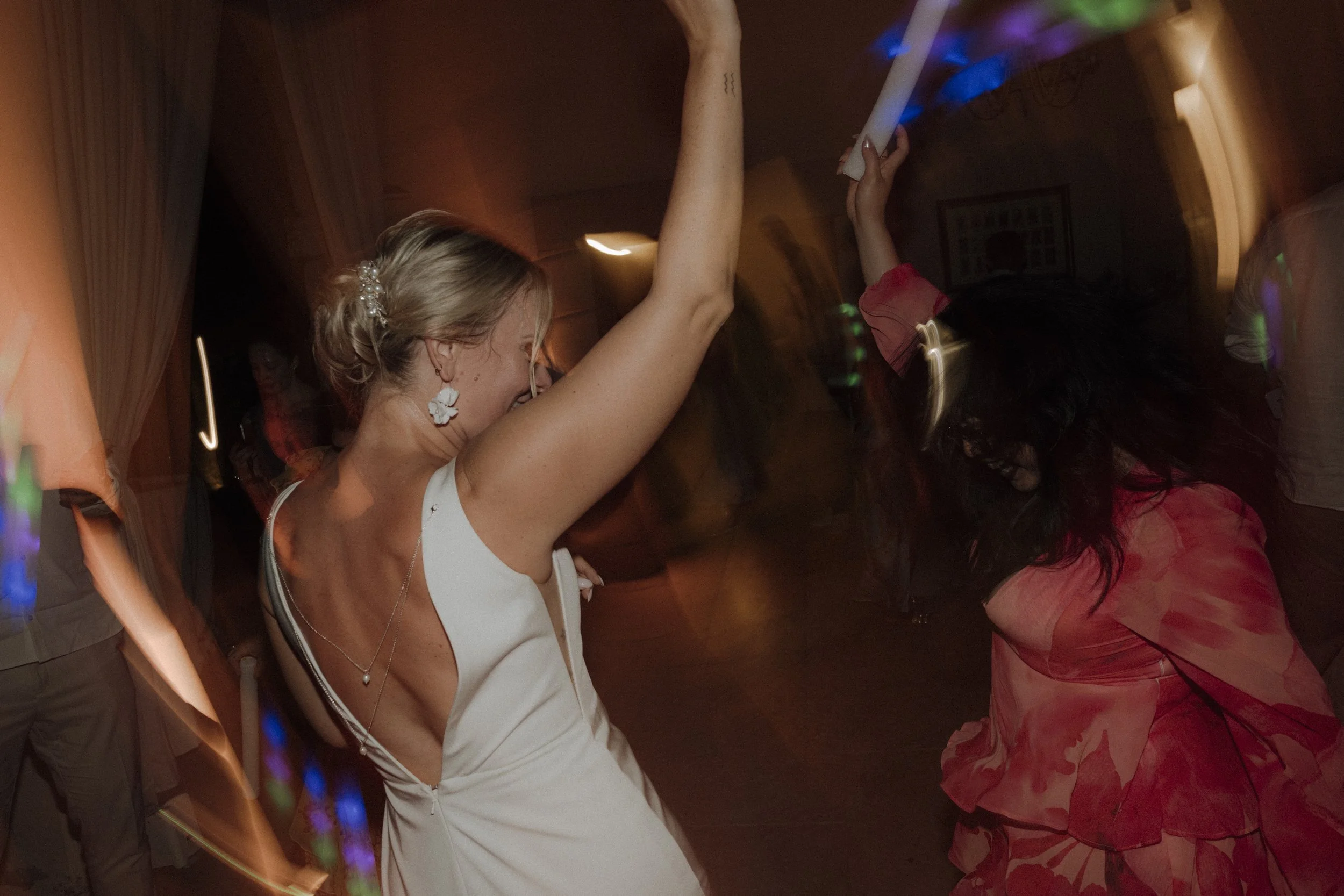 Wedding guests dancing and celebrating at a outdoor party in Verona villa