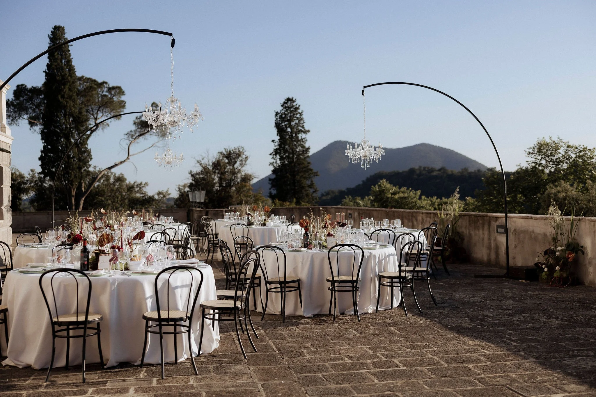 Romantic sunset wedding dinner on the terrace of Villa Selvatico overlooking the Euganean Hills.