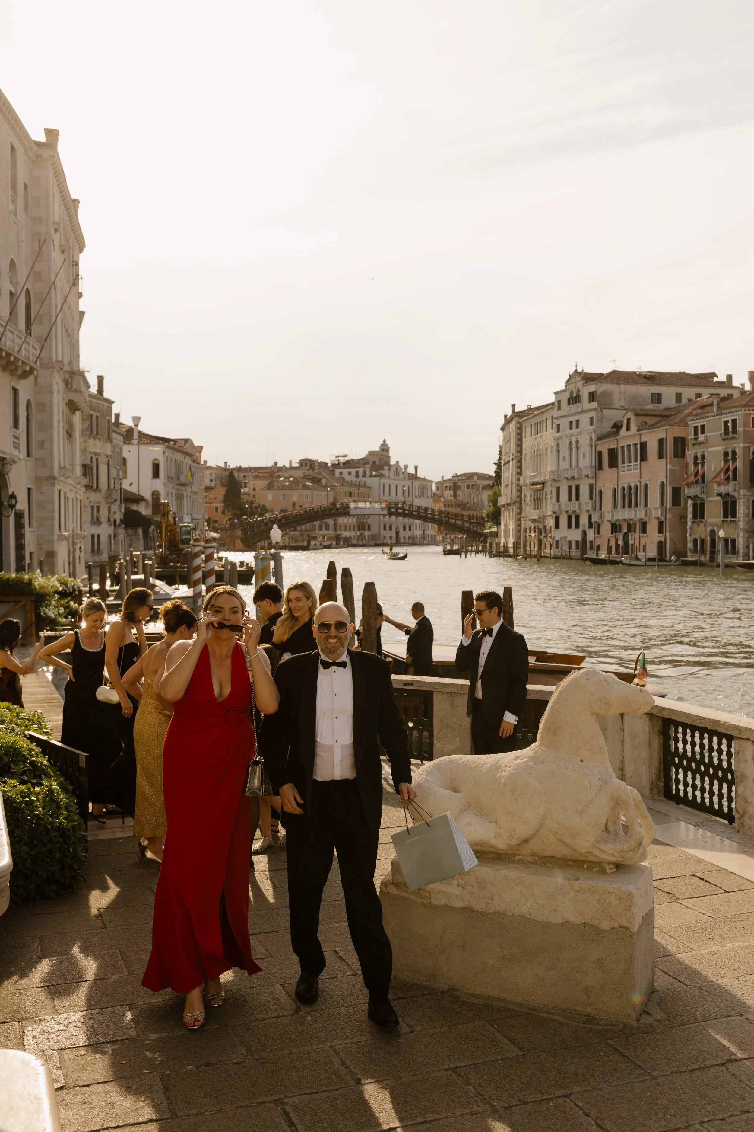 Welcome cocktail party on a Venetian rooftop terrace by sunset