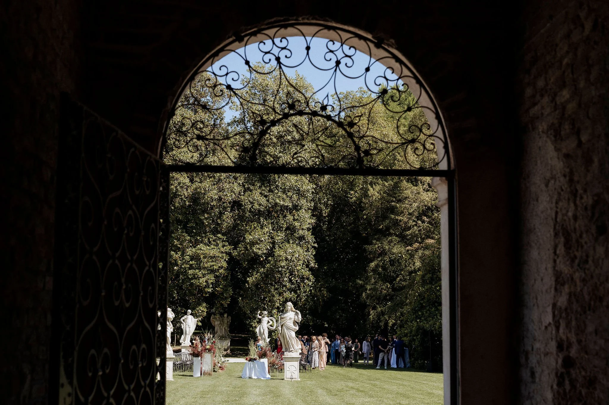 Outdoor wedding ceremony on the lawn at Villa Selvatico.