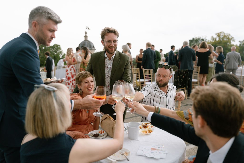 wedding guests enjoying an aperitif on a castle terrace in Veneto