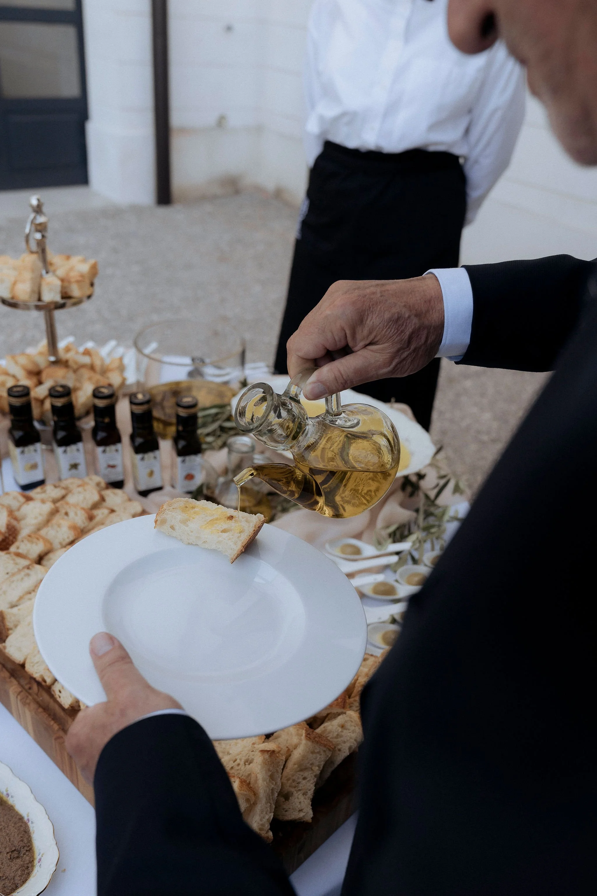 Interactive Italian Olive Bar featuring regional olives and olive oil tasting at an Italian destination wedding.