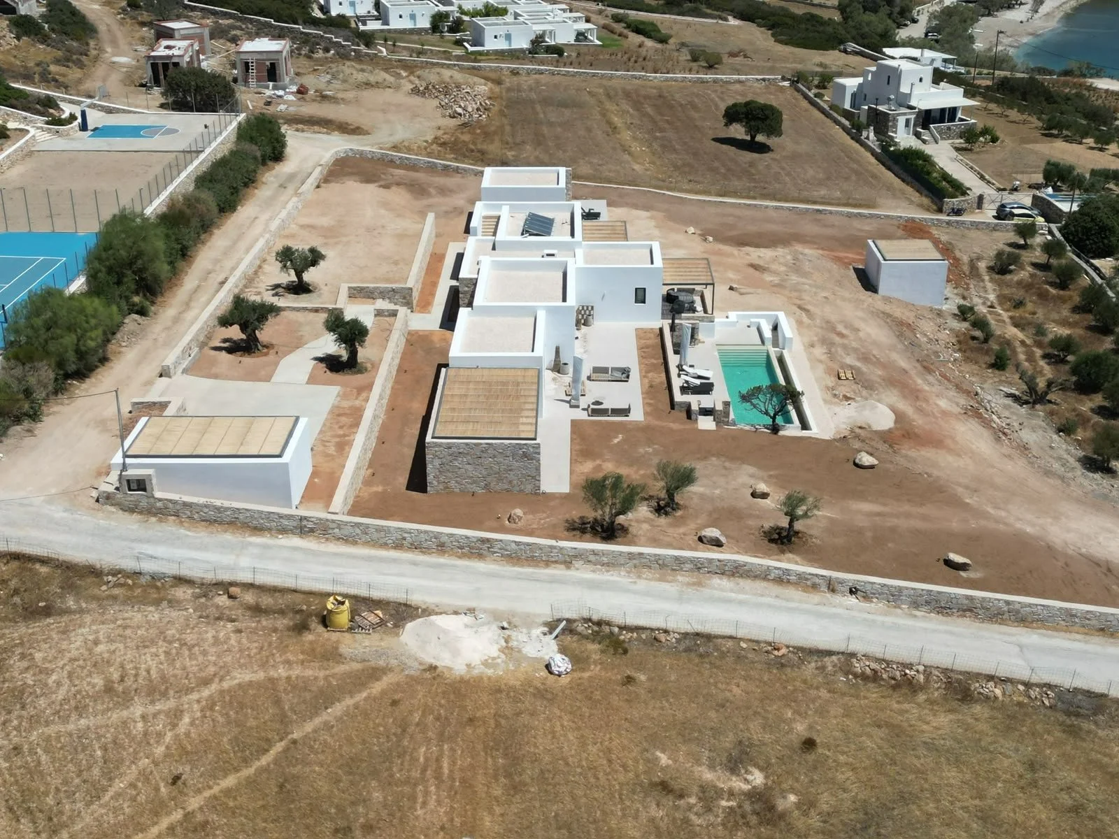 villa-glyfa-paros-pool-terrace-pergolas-aerial-02.jpg
