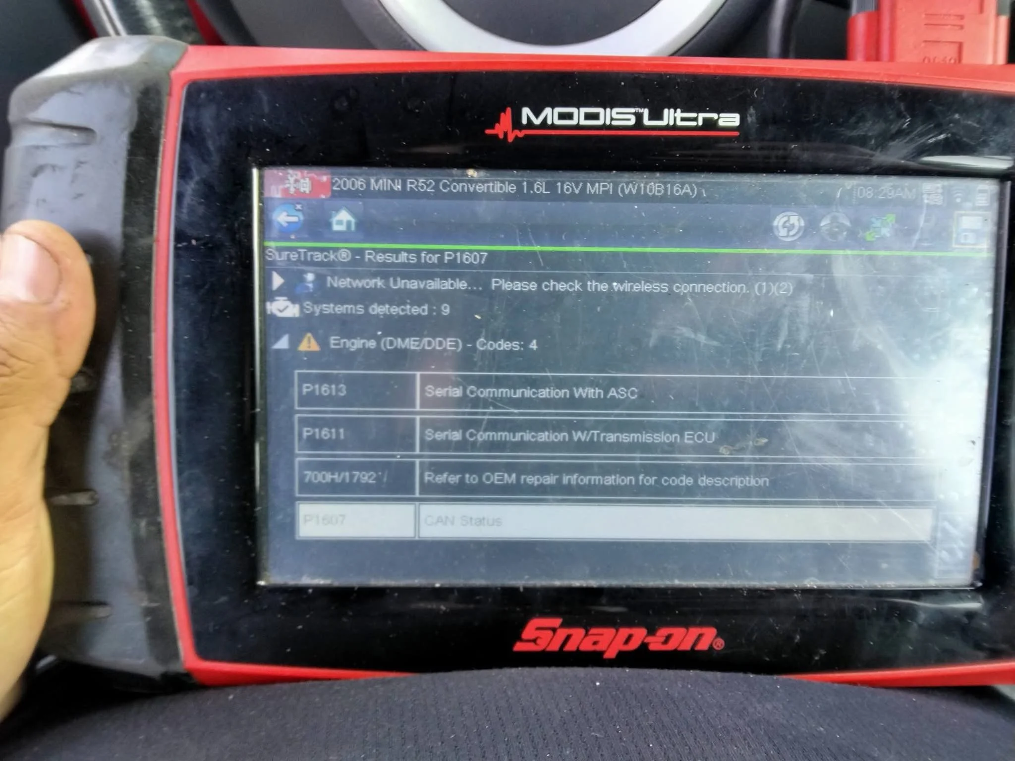 A Snap-on automotive diagnostic scanner screen displaying results for a 2006 Mini Cooper R52 Convertible with engine codes and system diagnostics.