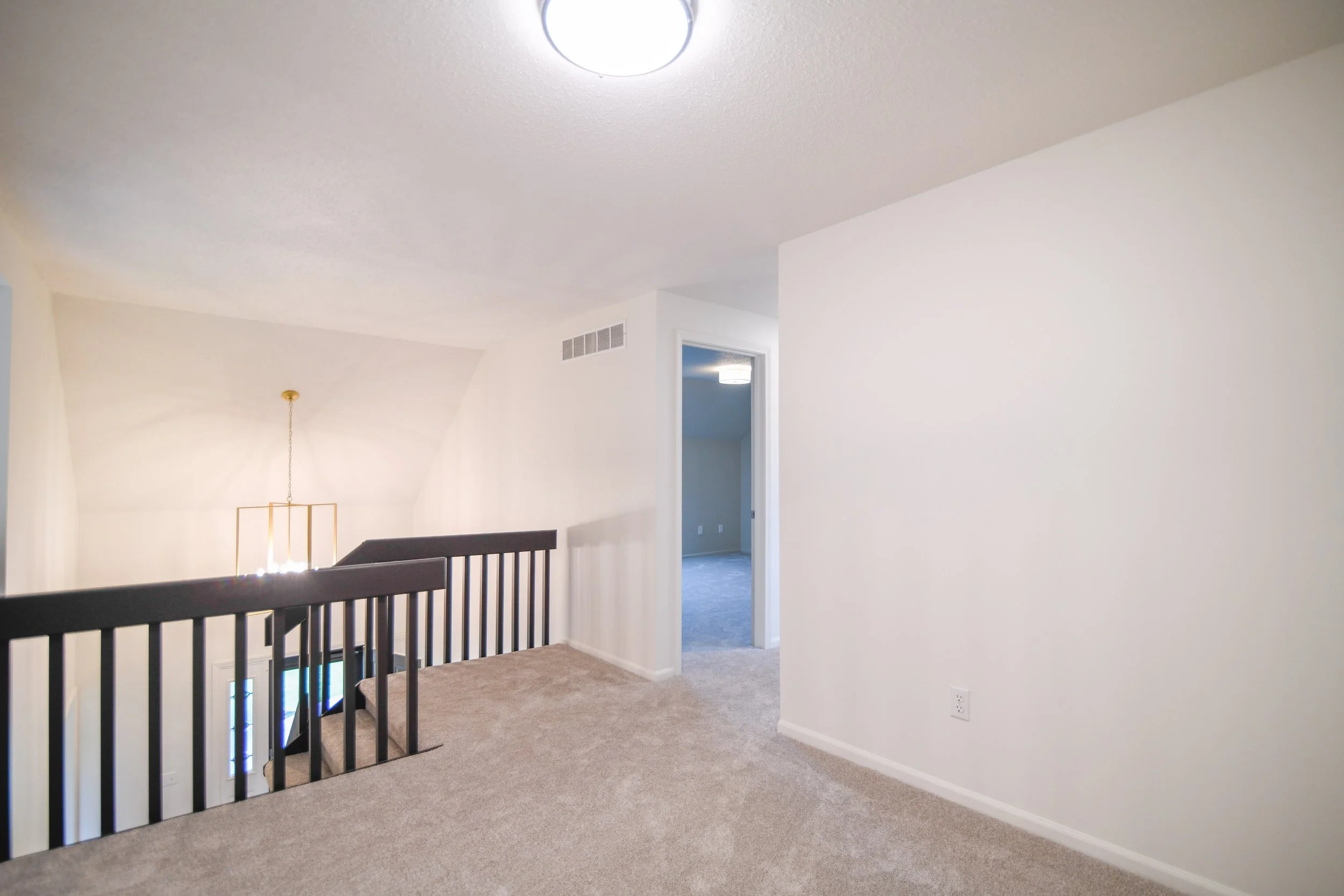 Second-floor landing leads to upstairs bedrooms