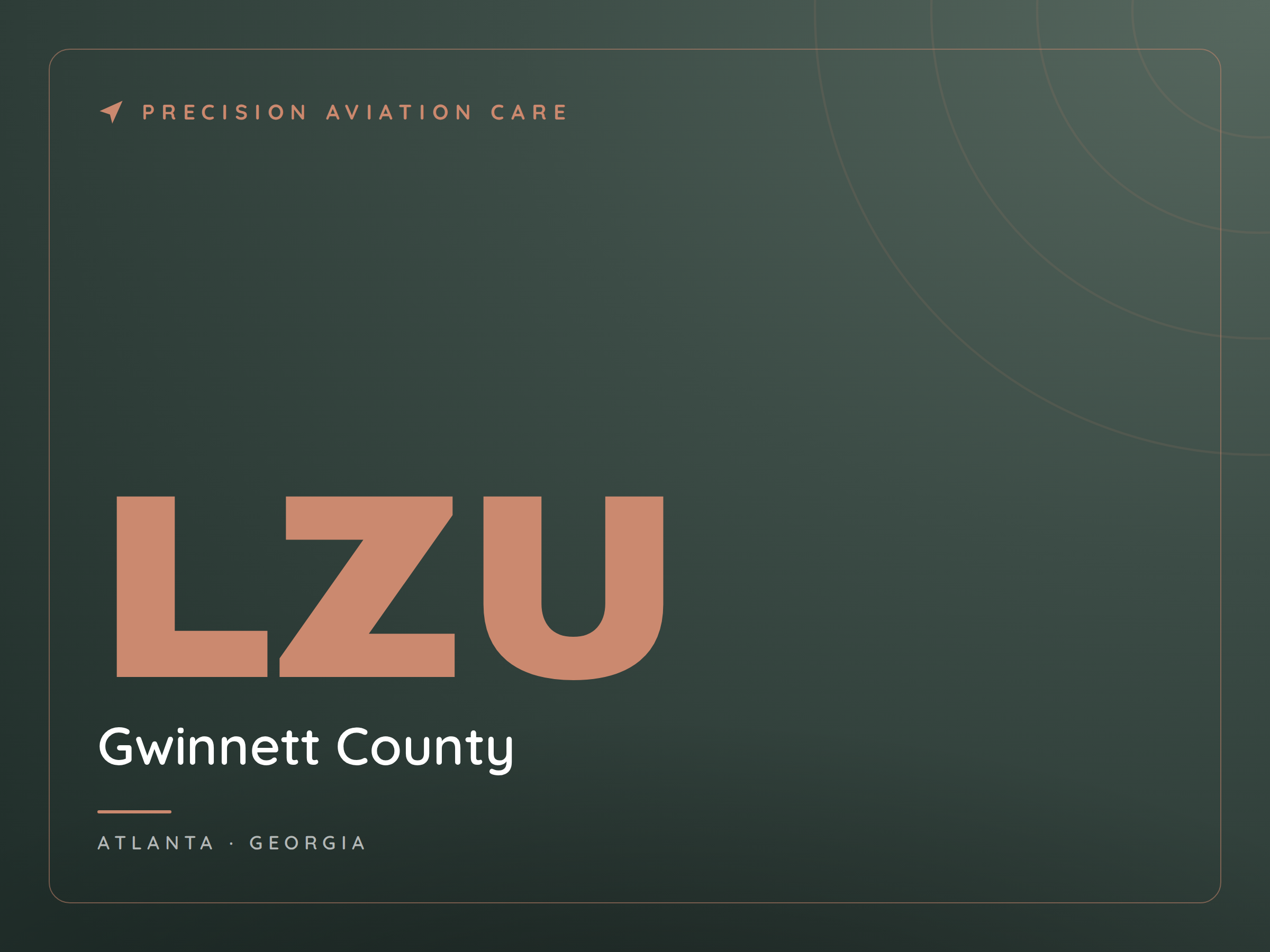 Close-up of a digital sign displaying 'Gwinnett County' in large copper-colored letters, with 'Atlanta, Georgia' at the bottom, on a dark green background with subtle circular designs.