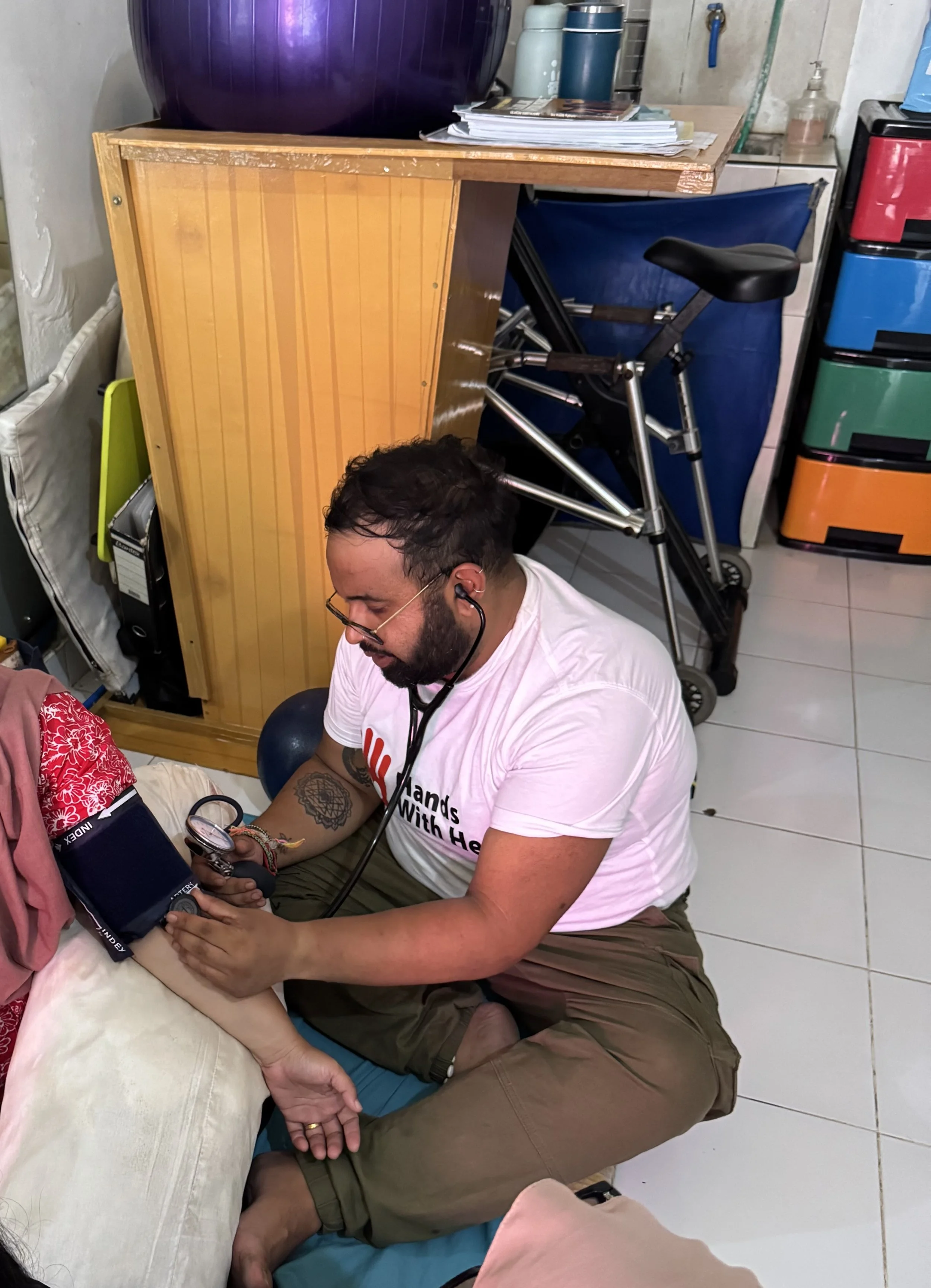 Providing community healthcare support during voluntary rehabilitation work abroad