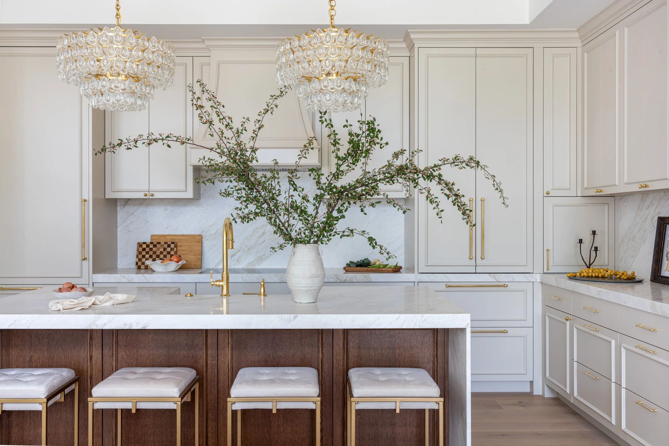 luxury kitchen design with show stopping kitchen island and off white cabinetry