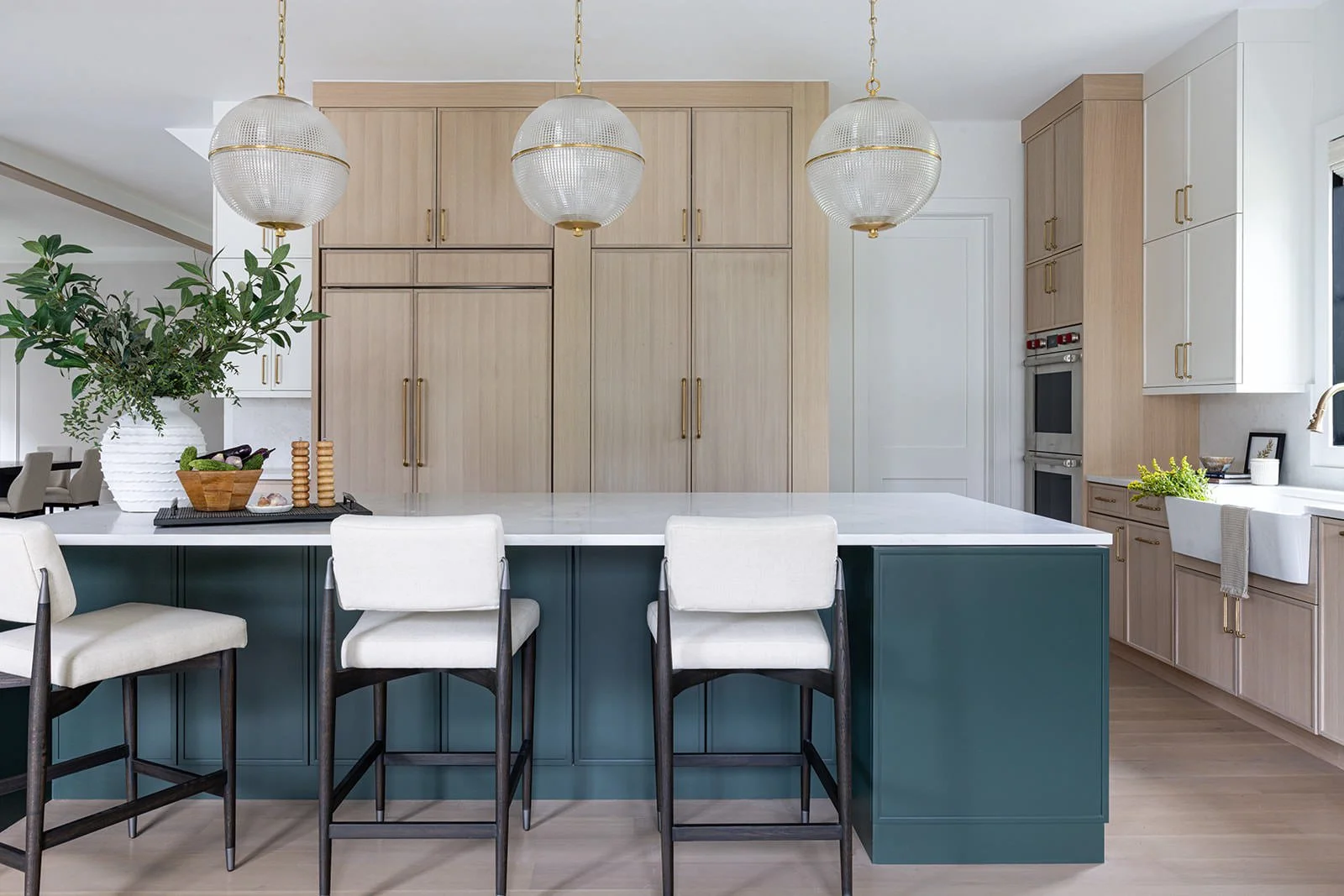 modern kitchen design with bold kitchen island and chic pendant lights