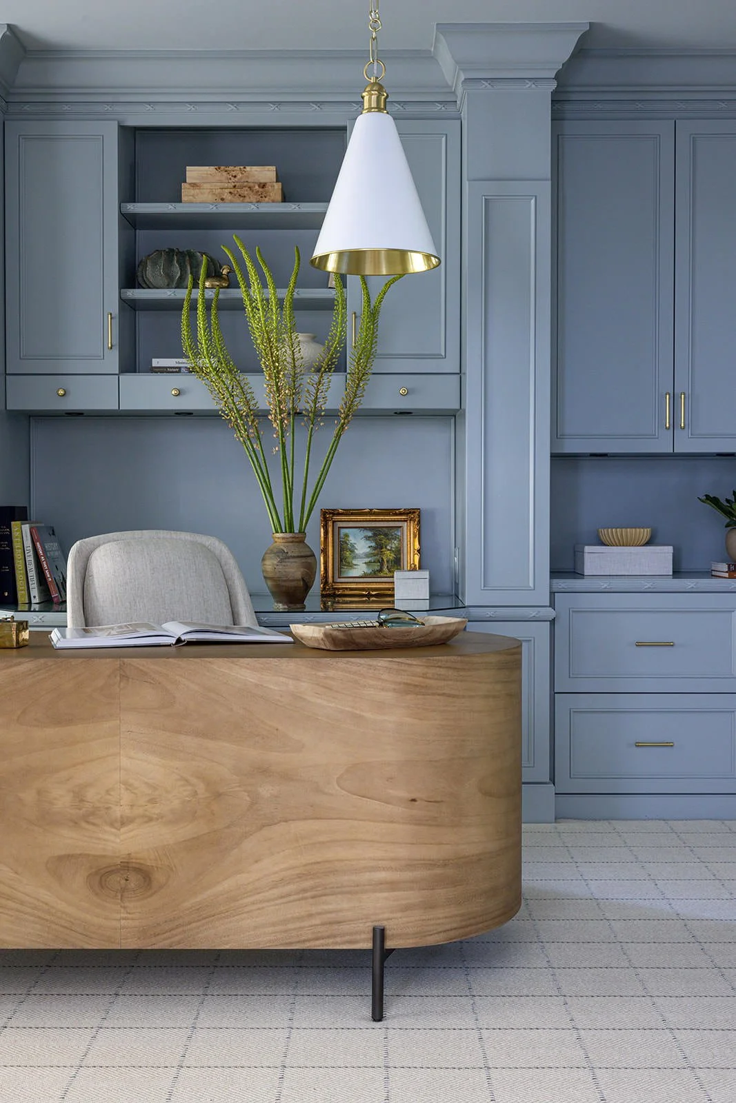blue drenched at home office with warm wood accents