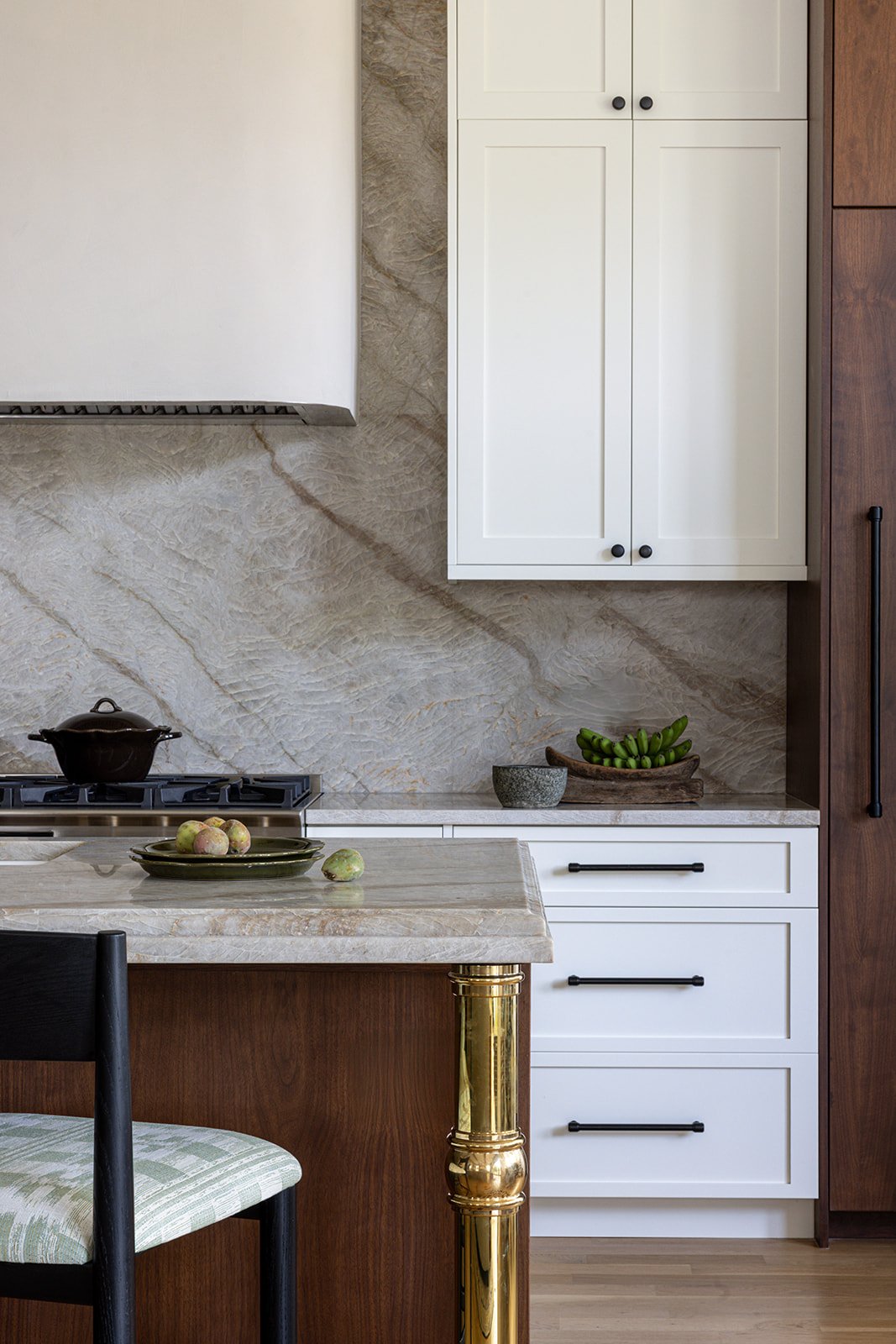 interiors kitchen photo of granite slab backsplash with walnut kitchen cabinets