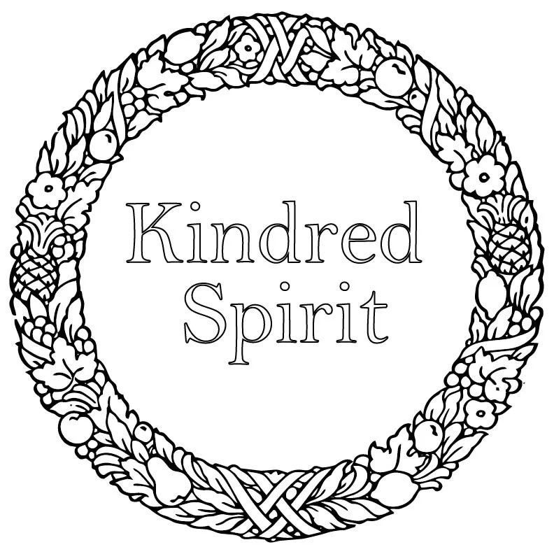 Black and white coloring page with a circular floral wreath and the words "Kindred Spirit" in the center.