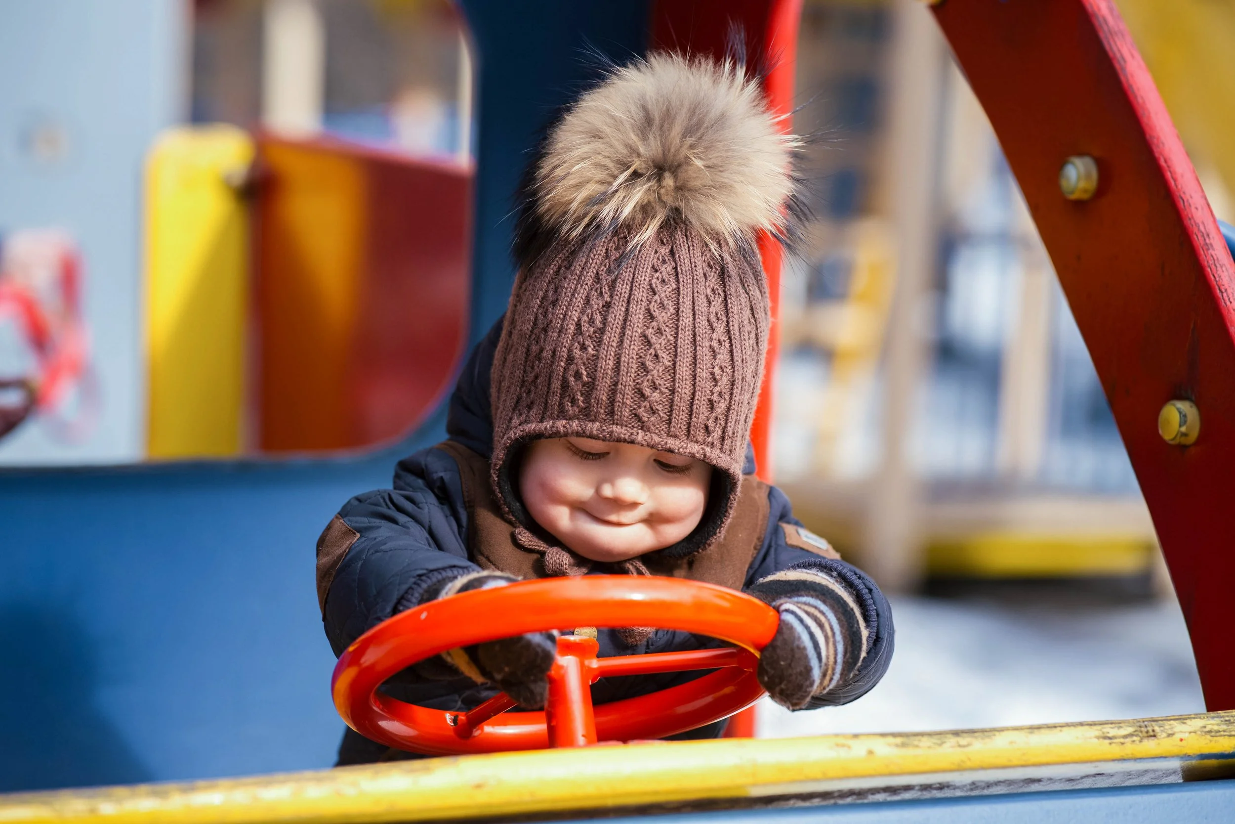 funny-little-boy-plays-with-toy-car-park.jpg