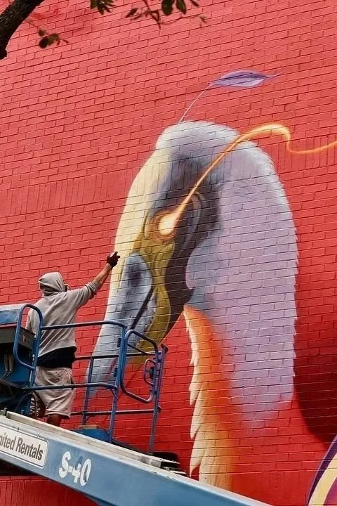Artist Bublegum (Tirso Paz) creating a large-scale mural. Professional urban artist and creator of the Ornamental Style, specialized in international public art commissions and contemporary fine art.