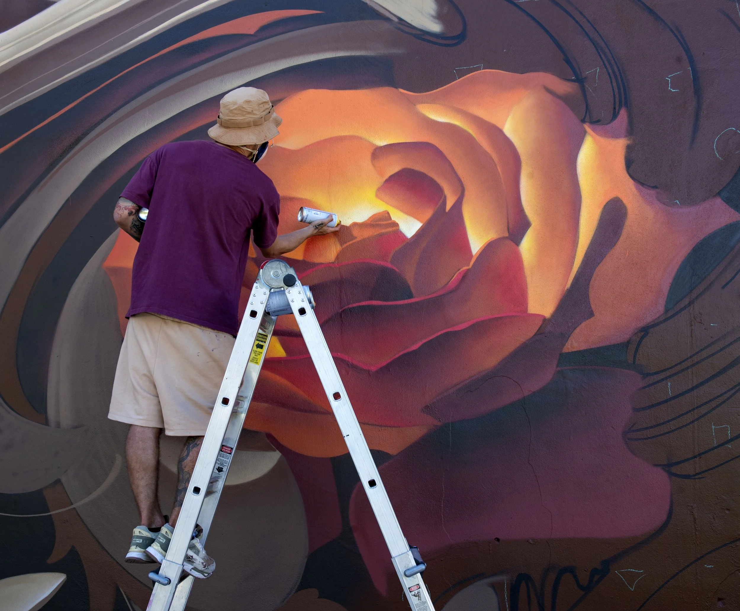 Artist Bublegum (Tirso Paz) creating a large-scale mural. Professional urban artist and creator of the Ornamental Style, specialized in international public art commissions and contemporary fine art.