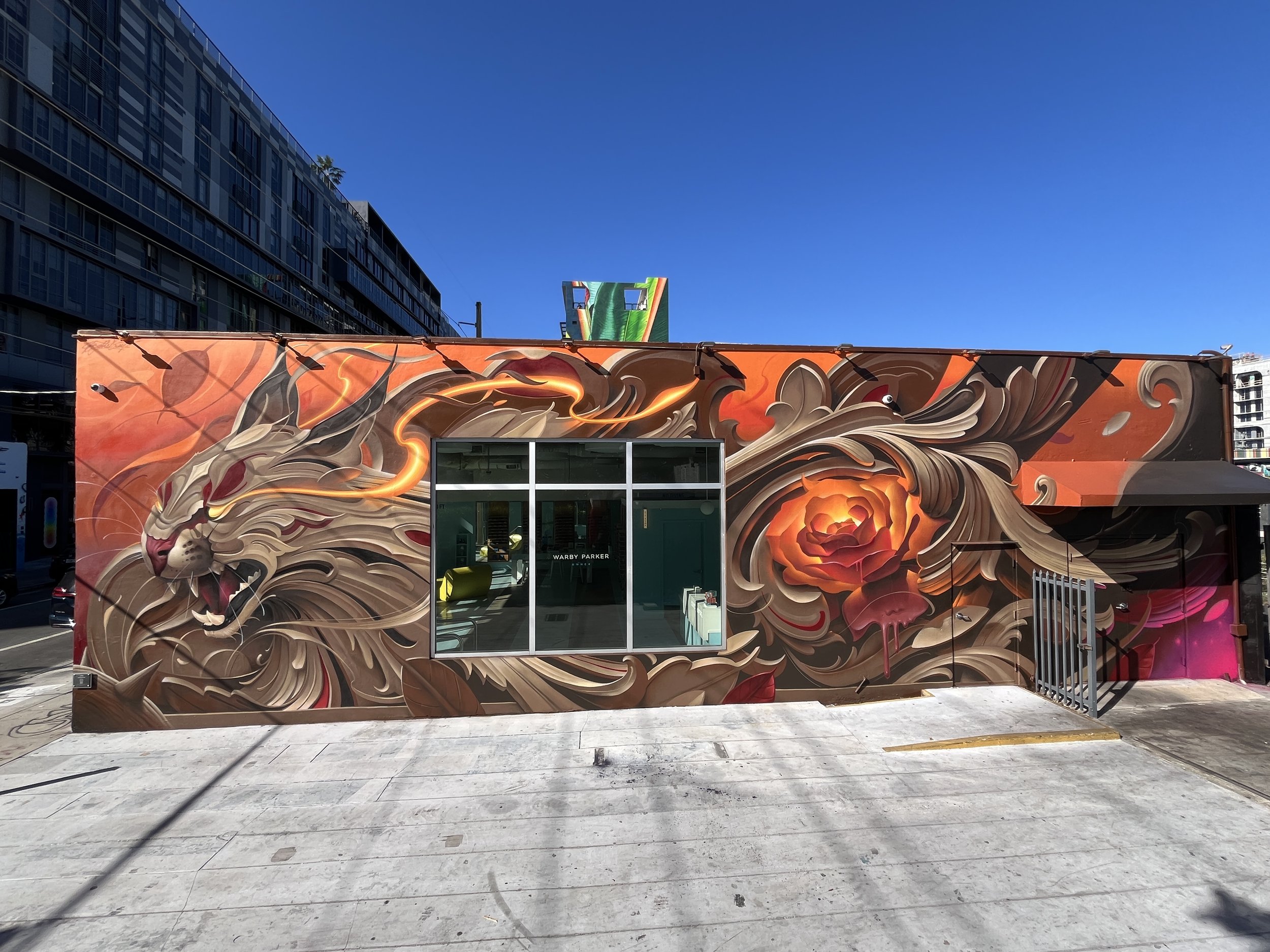 Ornamental Caracal mural by Bublegum (Tirso Paz) at Wynwood Walls, Miami. A world-class urban art piece featuring a caracal in the signature Ornamental Style, blending vibrant nature motifs with the energy of the Miami Art District.