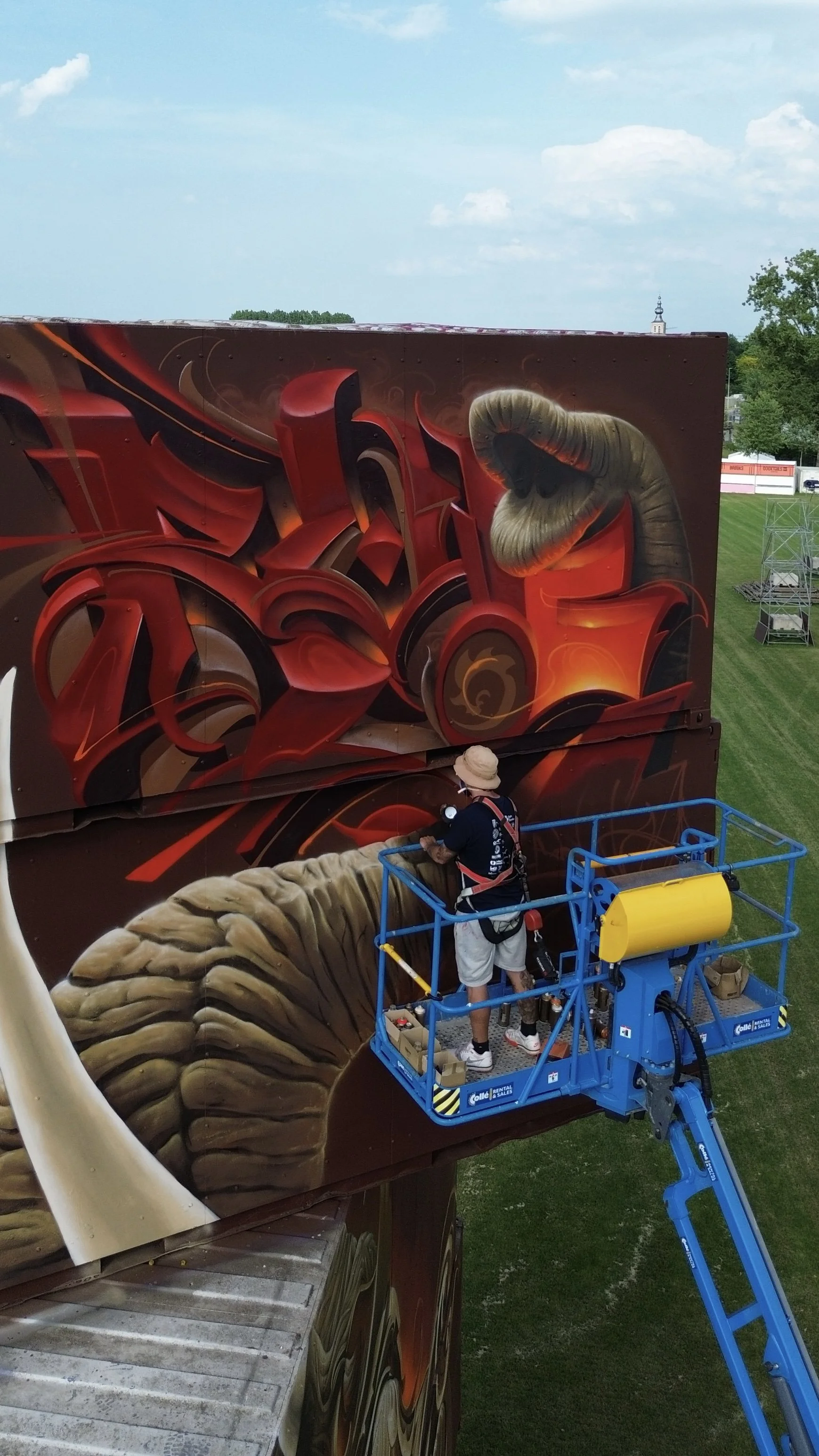 Artist Bublegum (Tirso Paz) creating a large-scale mural. Professional urban artist and creator of the Ornamental Style, specialized in international public art commissions and contemporary fine art.