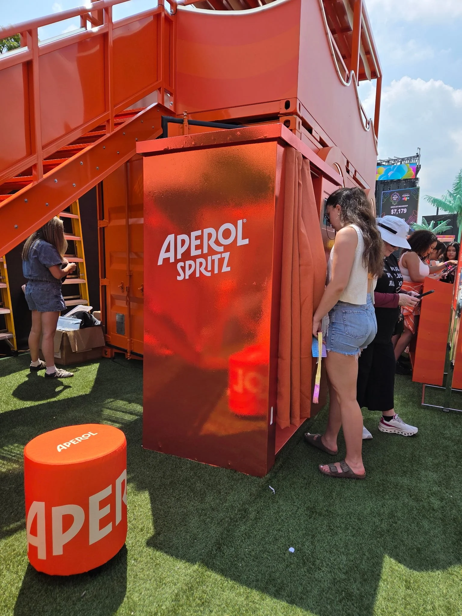 Enclosed Photo Booth at a festival with branded prints