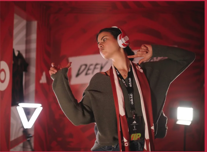 Guests creating immersive slow motion videos with a 360 video booth rental at a live event.