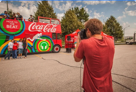 Event photographer capturing guest photos with instant photo processing and on-site prints.