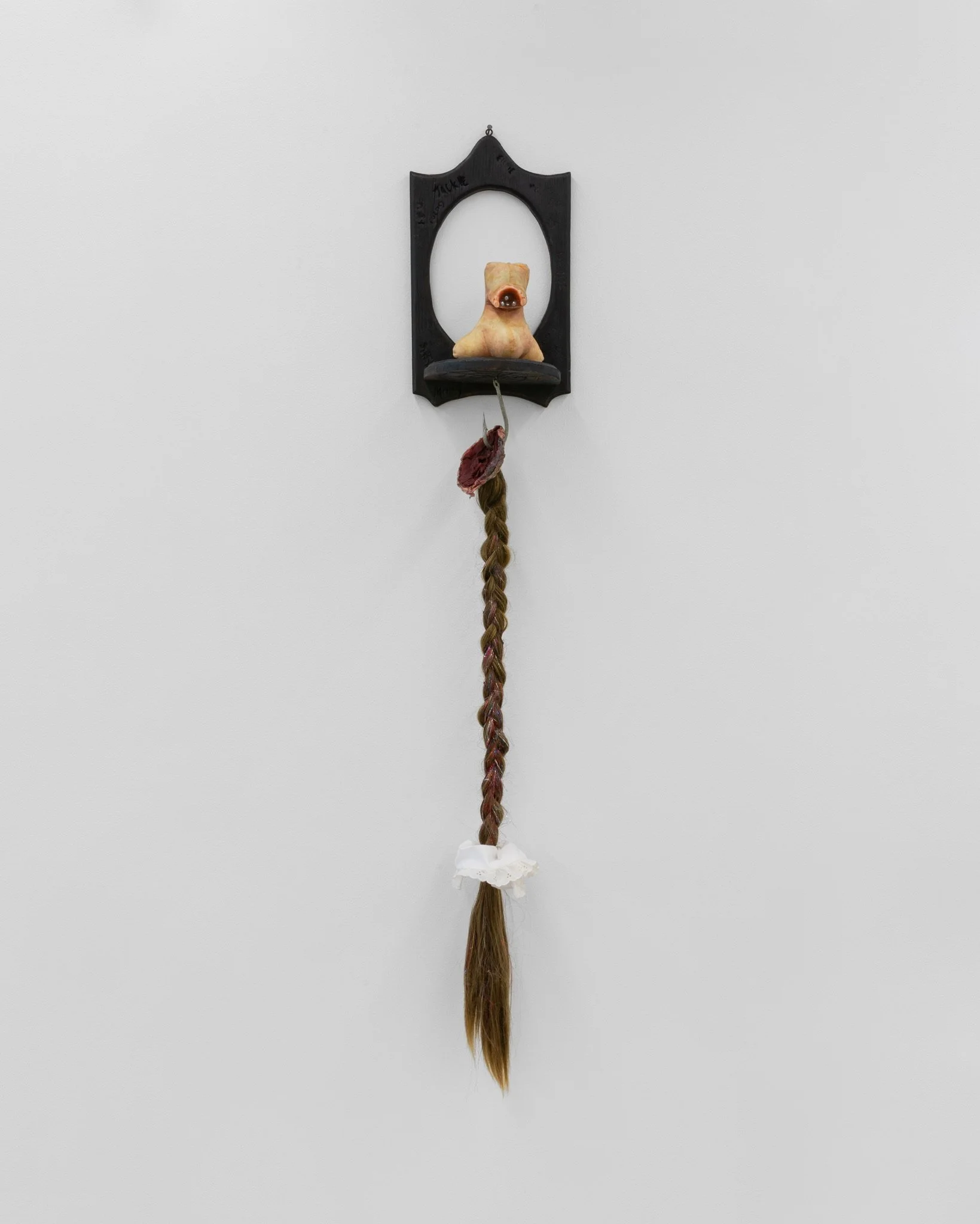 "Duckie (She was right, it never grew back.)".
Acrylic hair, beeswax, fabric, pigment, tuna hook, tinsel, terahertz, wood, thread. 
48”L x 7”W x 12”D. 2026