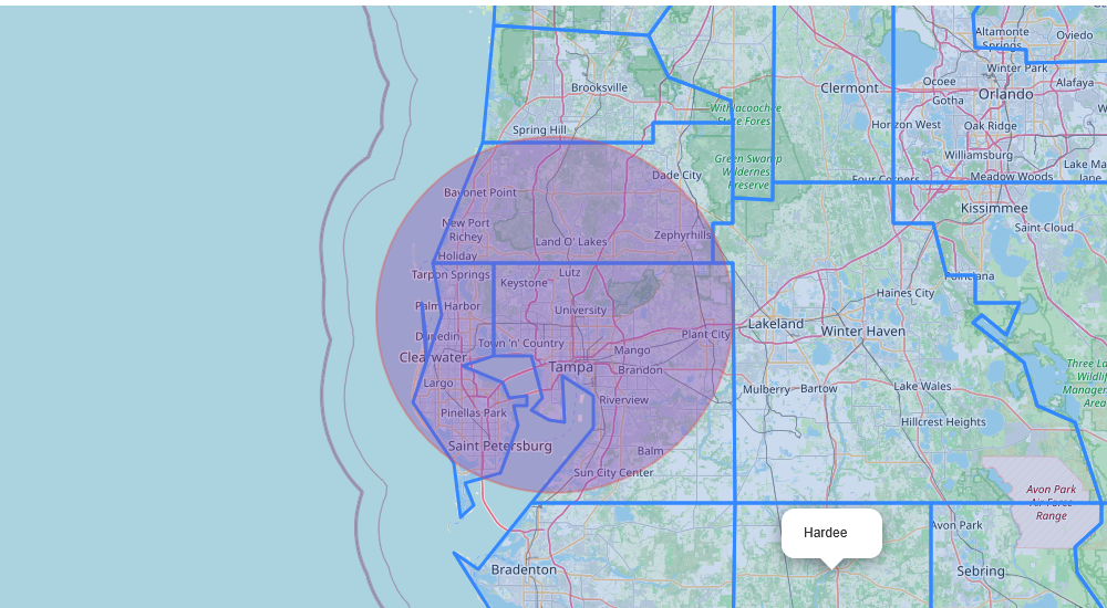 Map of Tampa, Florida, with a purple zone covering the city and surrounding areas including Saint Petersburg and Clearwater, and a white label indicating Hardee. The map includes nearby cities and parks, with various lines marking boundaries and roads.
