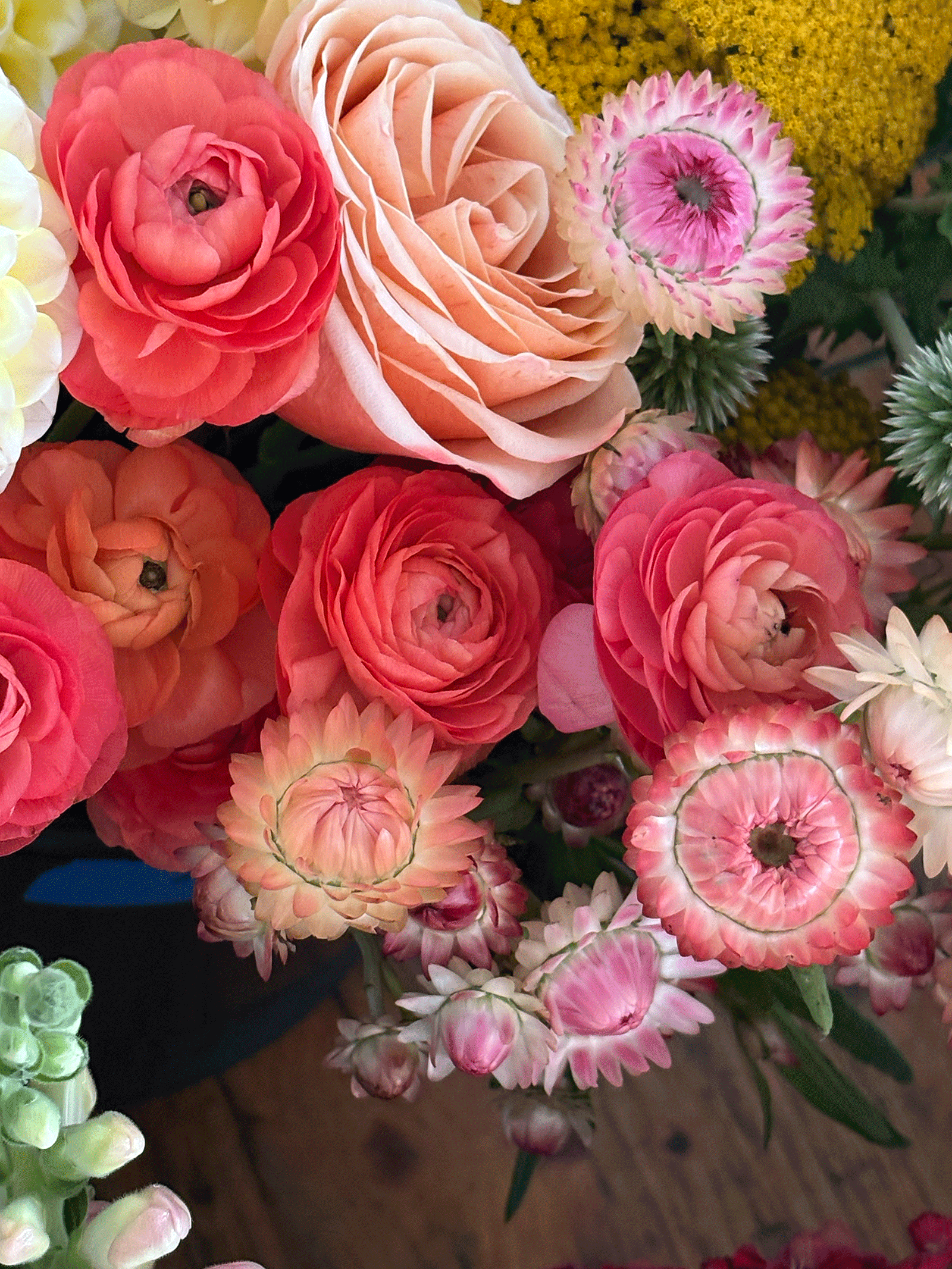 Pink and white floral arrangement at an elegant wedding celebration.