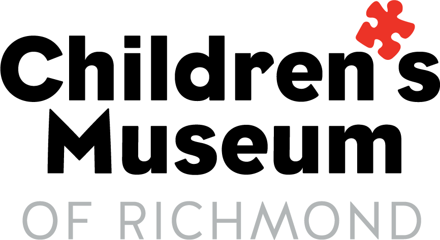 Logo for the Children's Museum of Richmond with black text and a red puzzle piece above the 's' in 'Children's'.