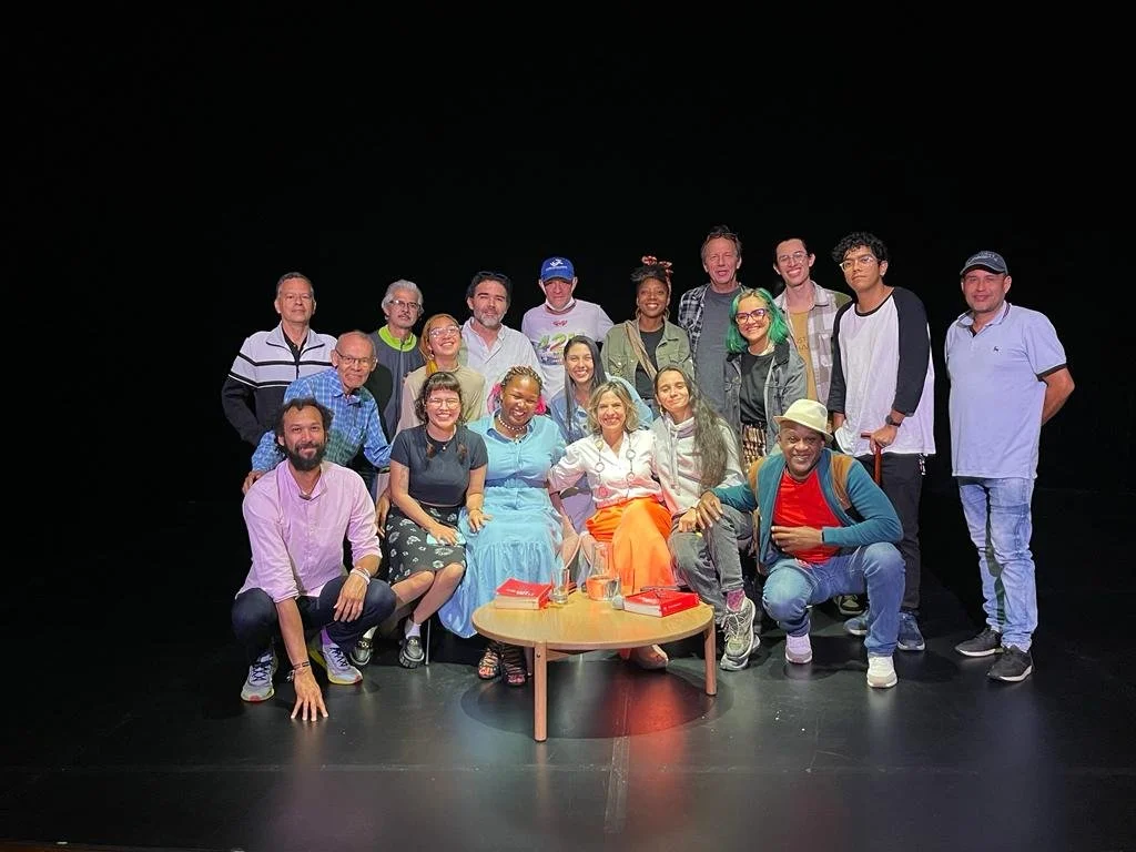 Dydine with storytellers and partners on stage in Colombia
