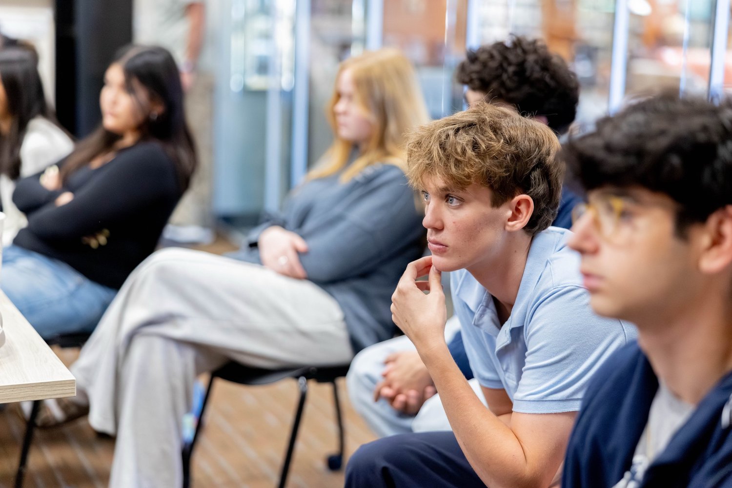 Students listening closely during a Kind Kulture storytelling session.