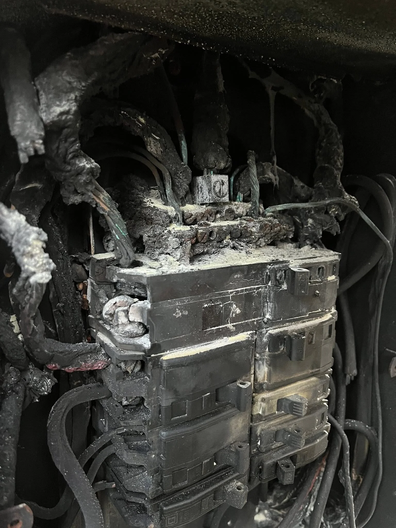 Severe electrical panel failure and fire damage. 24/7 emergency electrical repair and restoration by R&D Power Pros LLC.