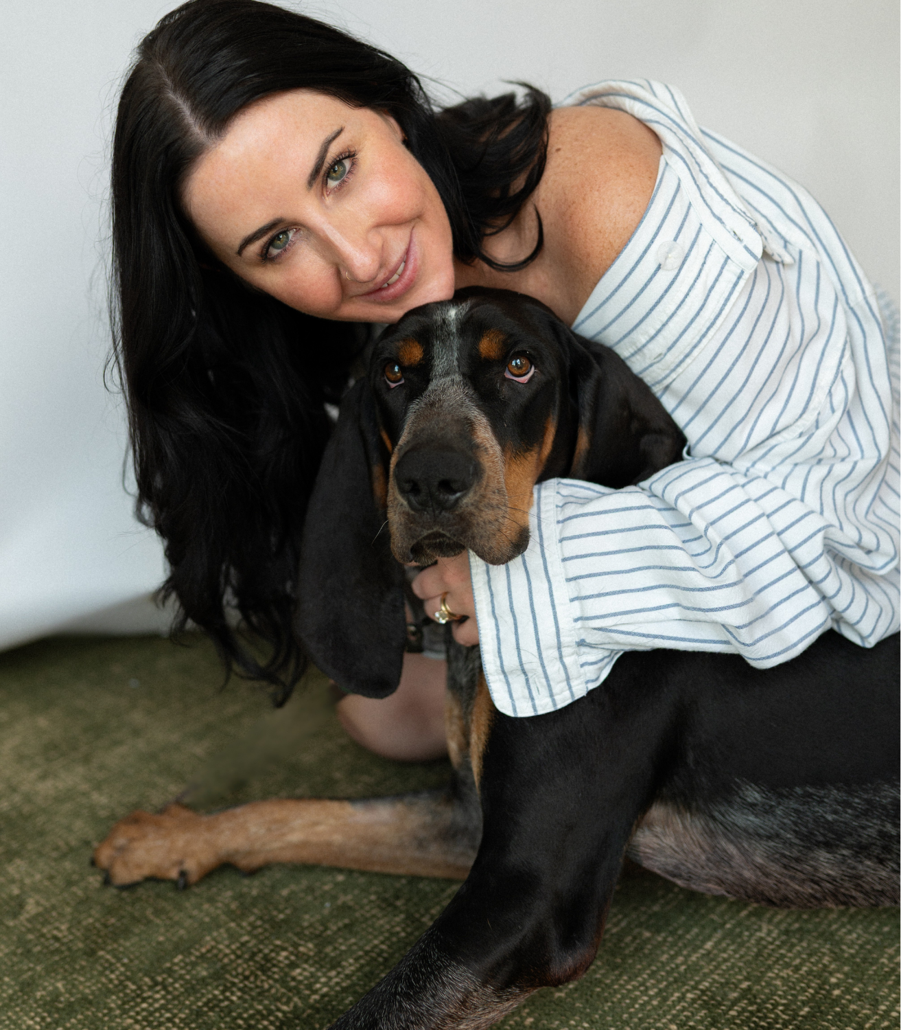 Hannah Morse Cuffman outside The Aesthetics Club Nashville with her dog