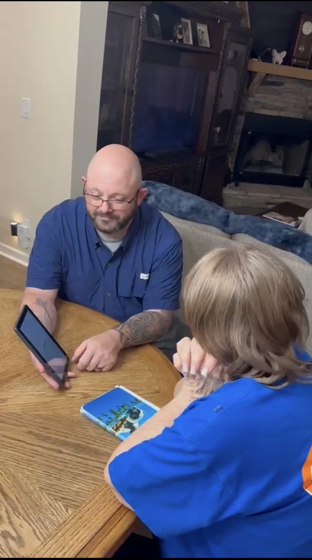 Cornerstone plumber explaining plumbing findings to a homeowner