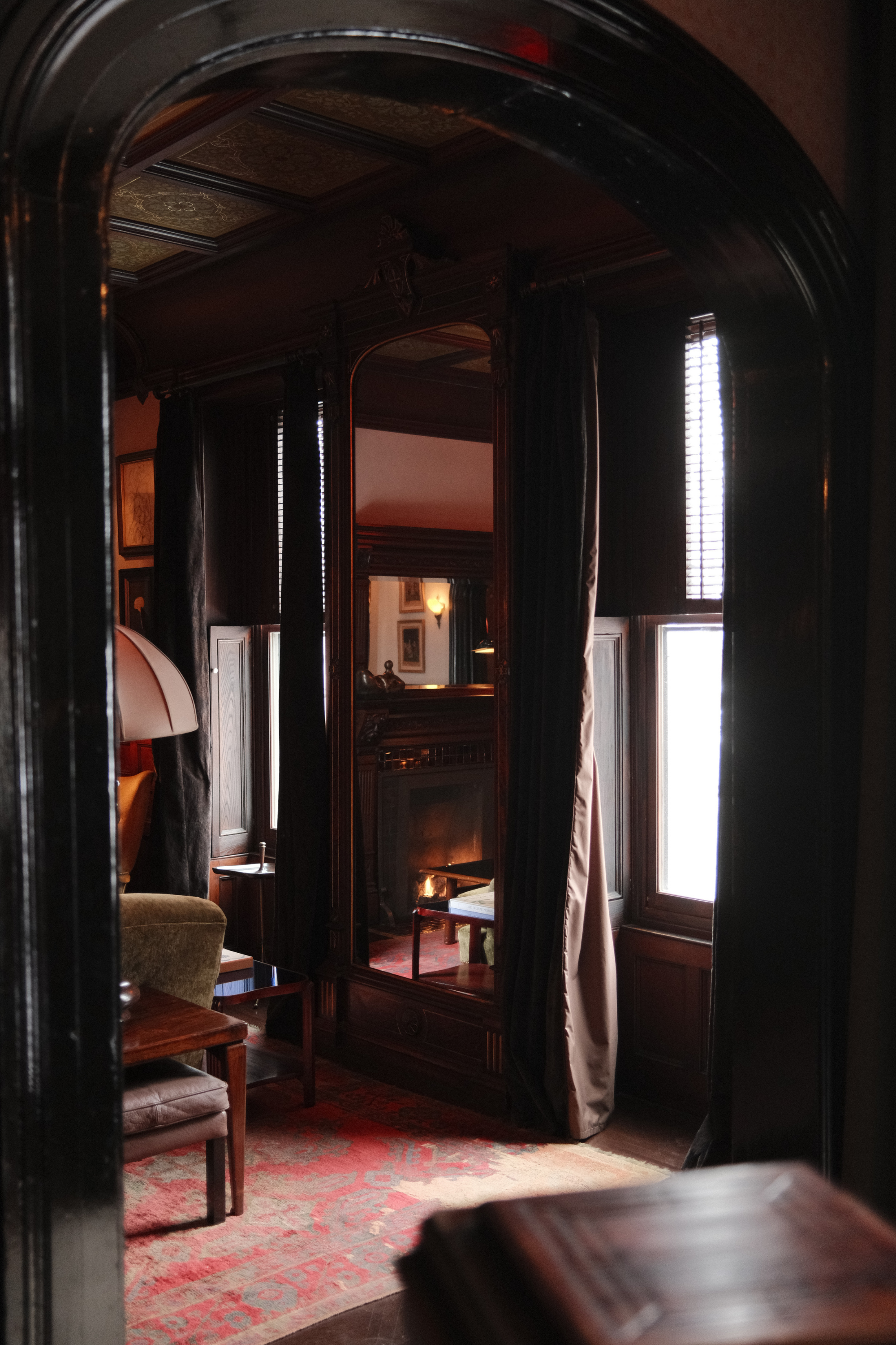 Look into lounge with large mirror